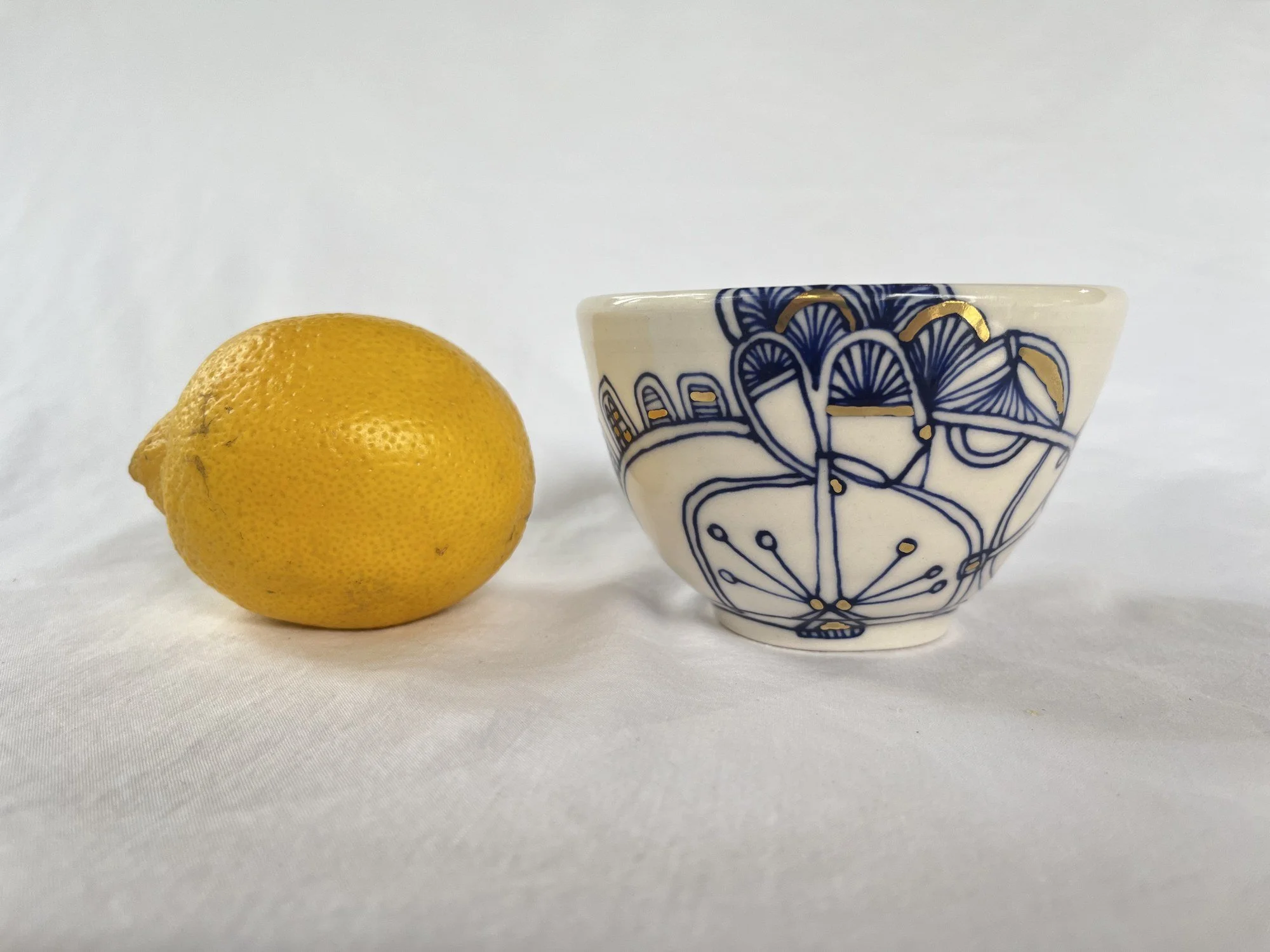 Hand-painted cobalt blue and gold luster porcelain bowl No. 001 by Cypress Knees Ceramics