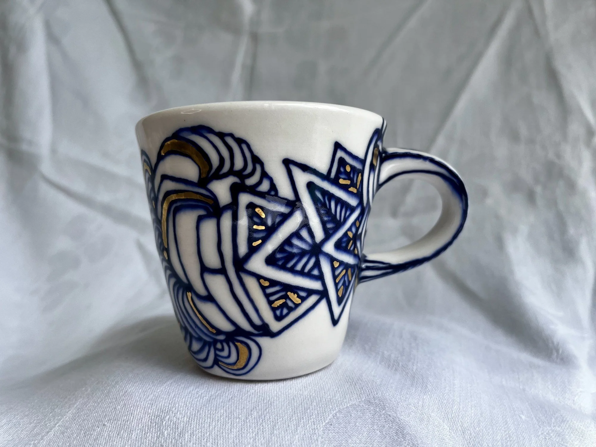 Hand-painted cobalt blue and gold luster porcelain mug No. 028 by Cypress Knees Ceramics