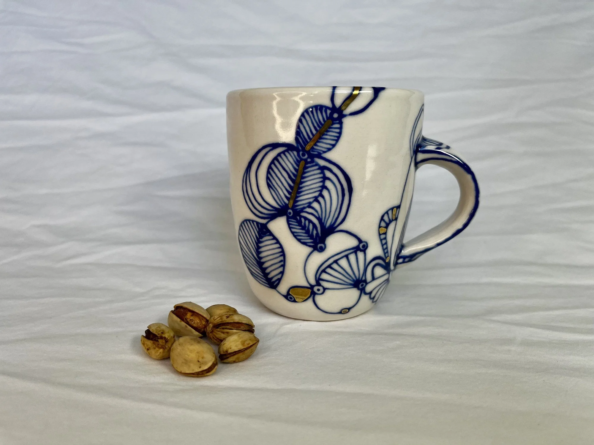 Cobalt blue line work and gold luster detail on handmade porcelain mug No. 025