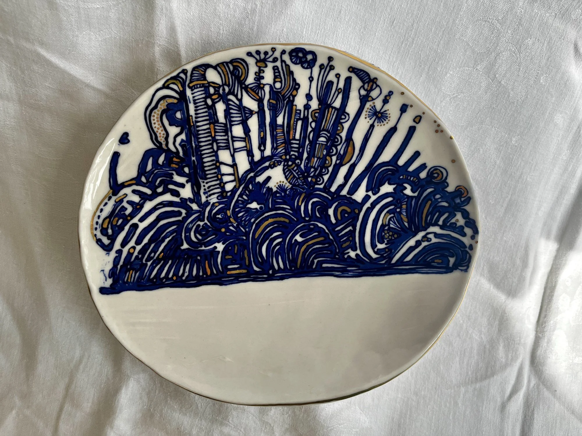 Freehand cobalt blue pattern drawn on a handmade porcelain serving dish No. 002