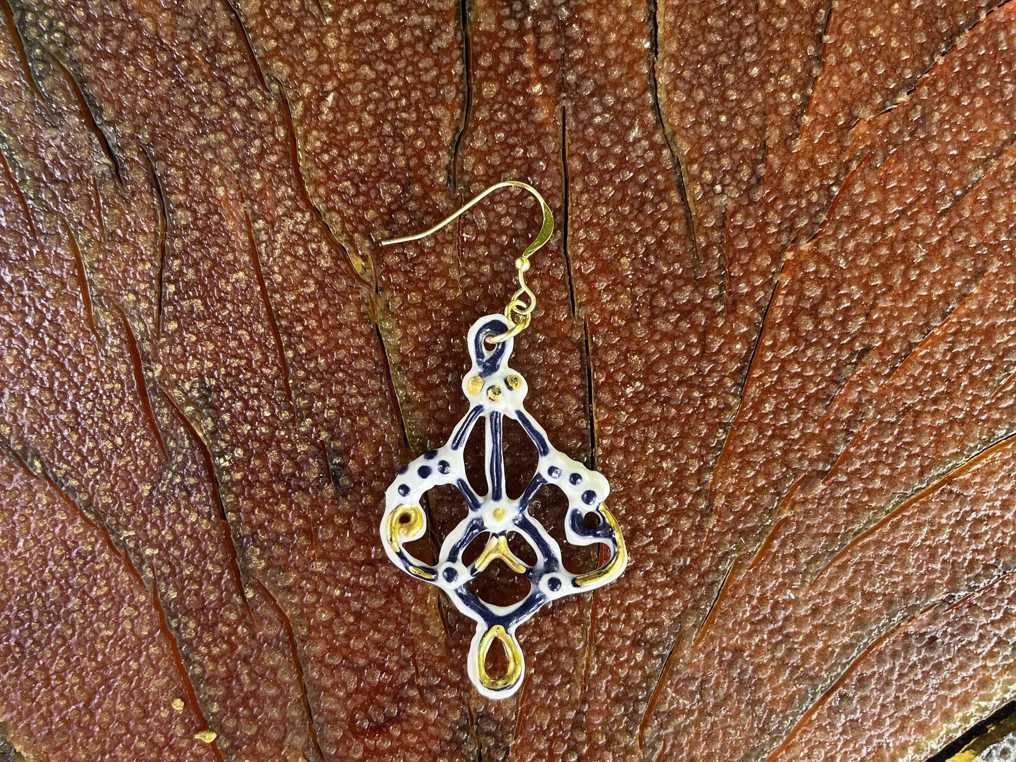 Hand-crafted porcelain earring No. 004 with cobalt blue line work and gold luster detail