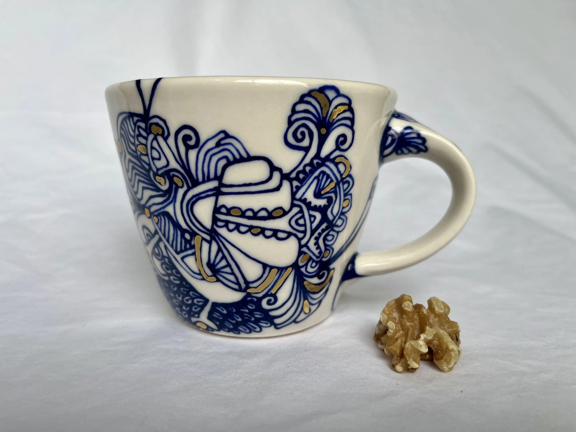 Cobalt blue line work and gold luster detail on handmade porcelain mug No. 008