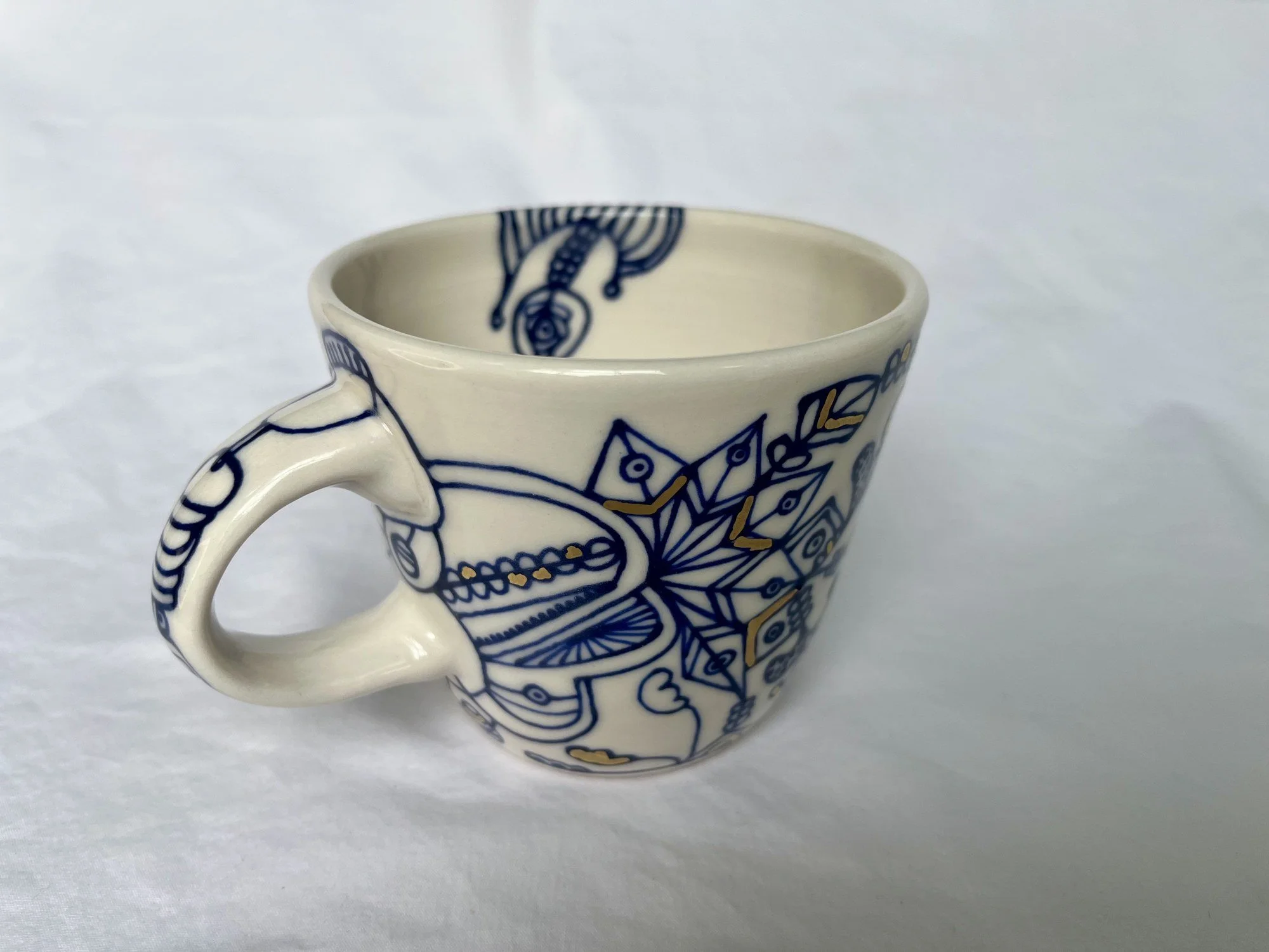Cobalt blue line work and gold luster detail on handmade porcelain mug No. 004