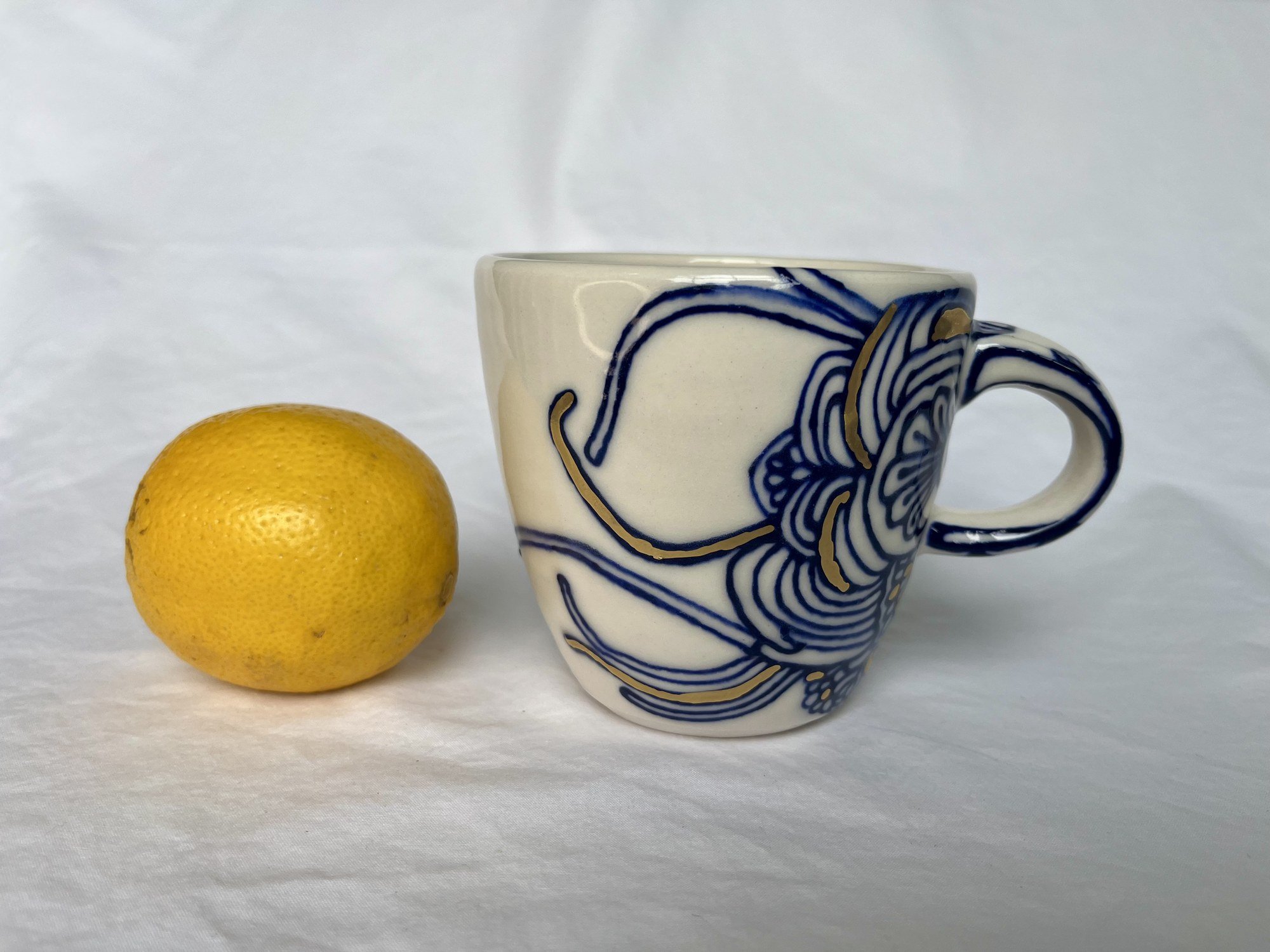Hand-painted cobalt blue and gold luster porcelain mug No. 007 by Cypress Knees Ceramics