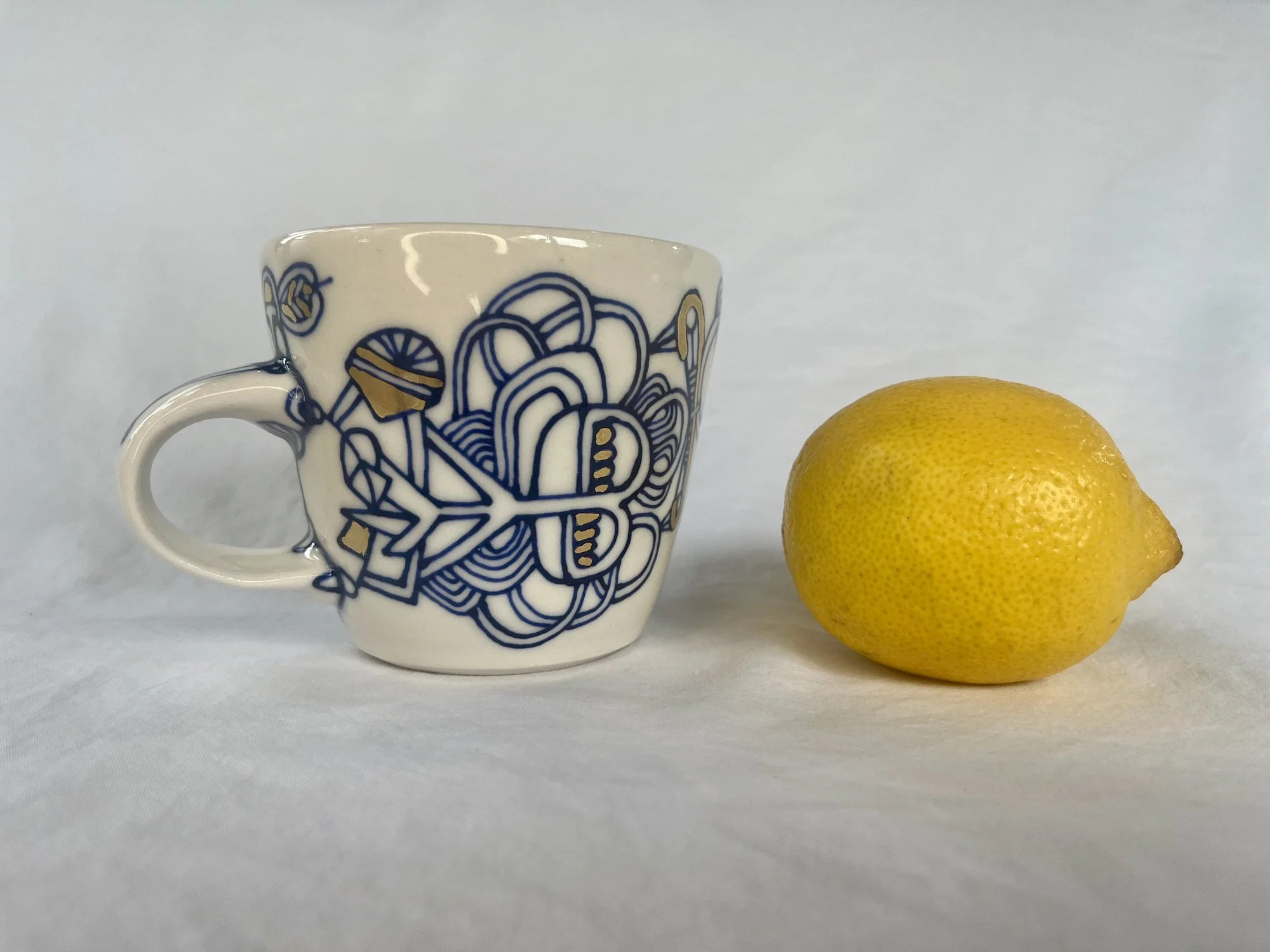 Hand-painted cobalt blue and gold luster porcelain mug No. 022 by Cypress Knees Ceramics