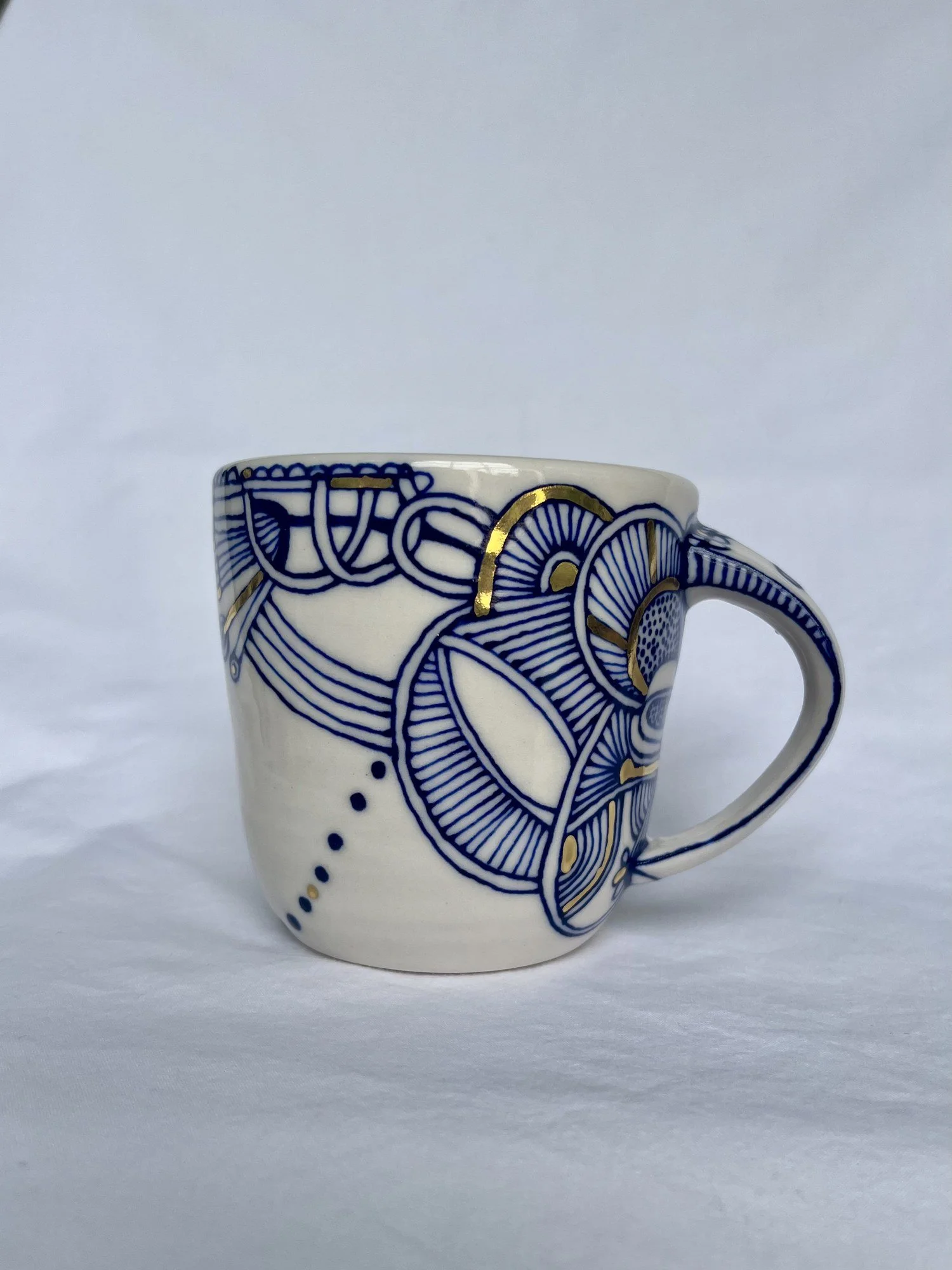 Hand-painted cobalt blue and gold luster porcelain mug No. 002 by Cypress Knees Ceramics