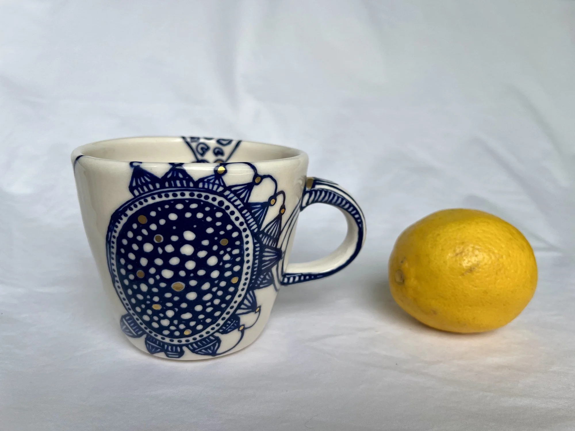 Cobalt blue line work and gold luster detail on handmade porcelain mug No. 012