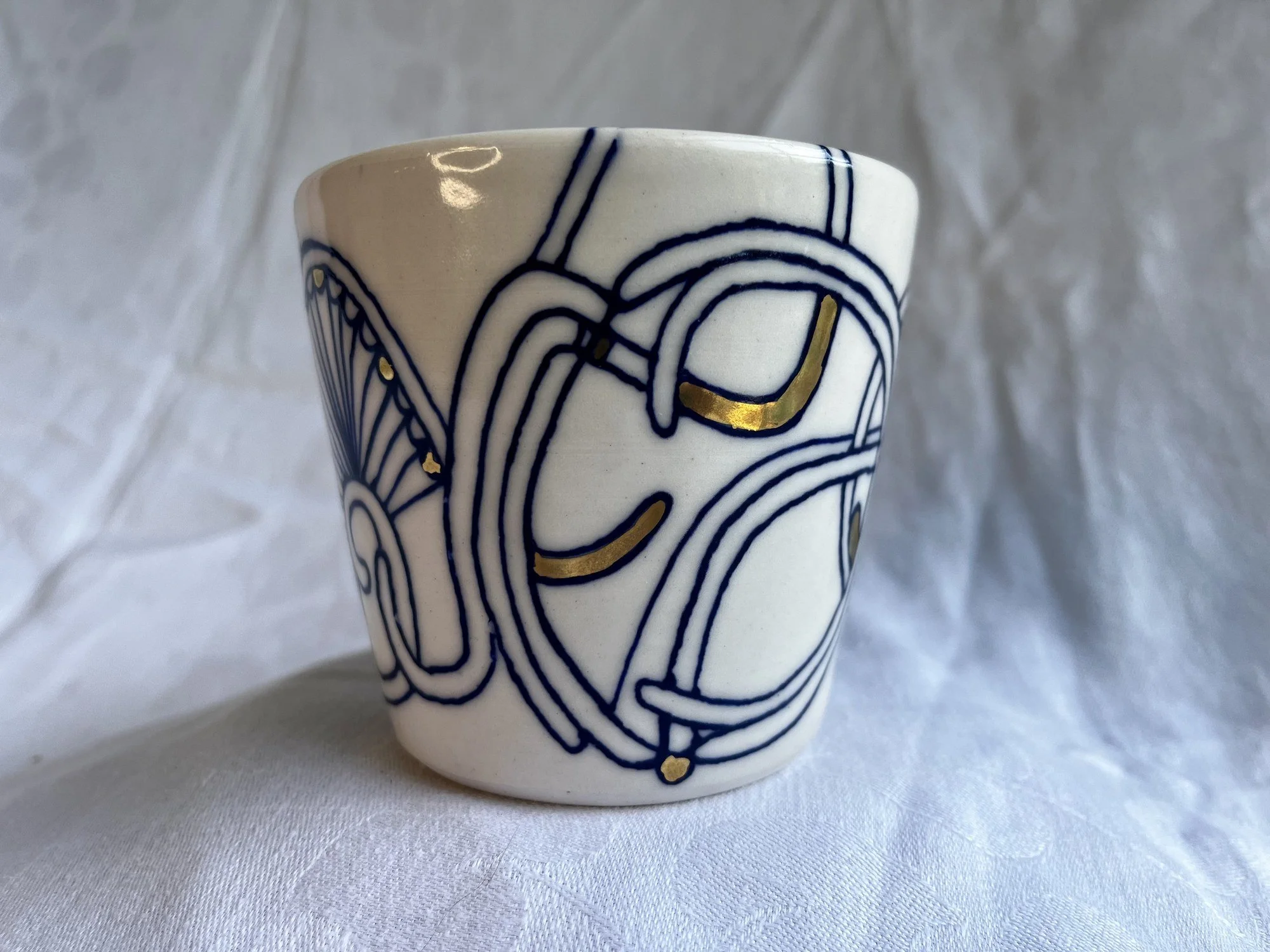 Wheel-thrown porcelain tumbler No. 001, hand-painted in Naples, Florida