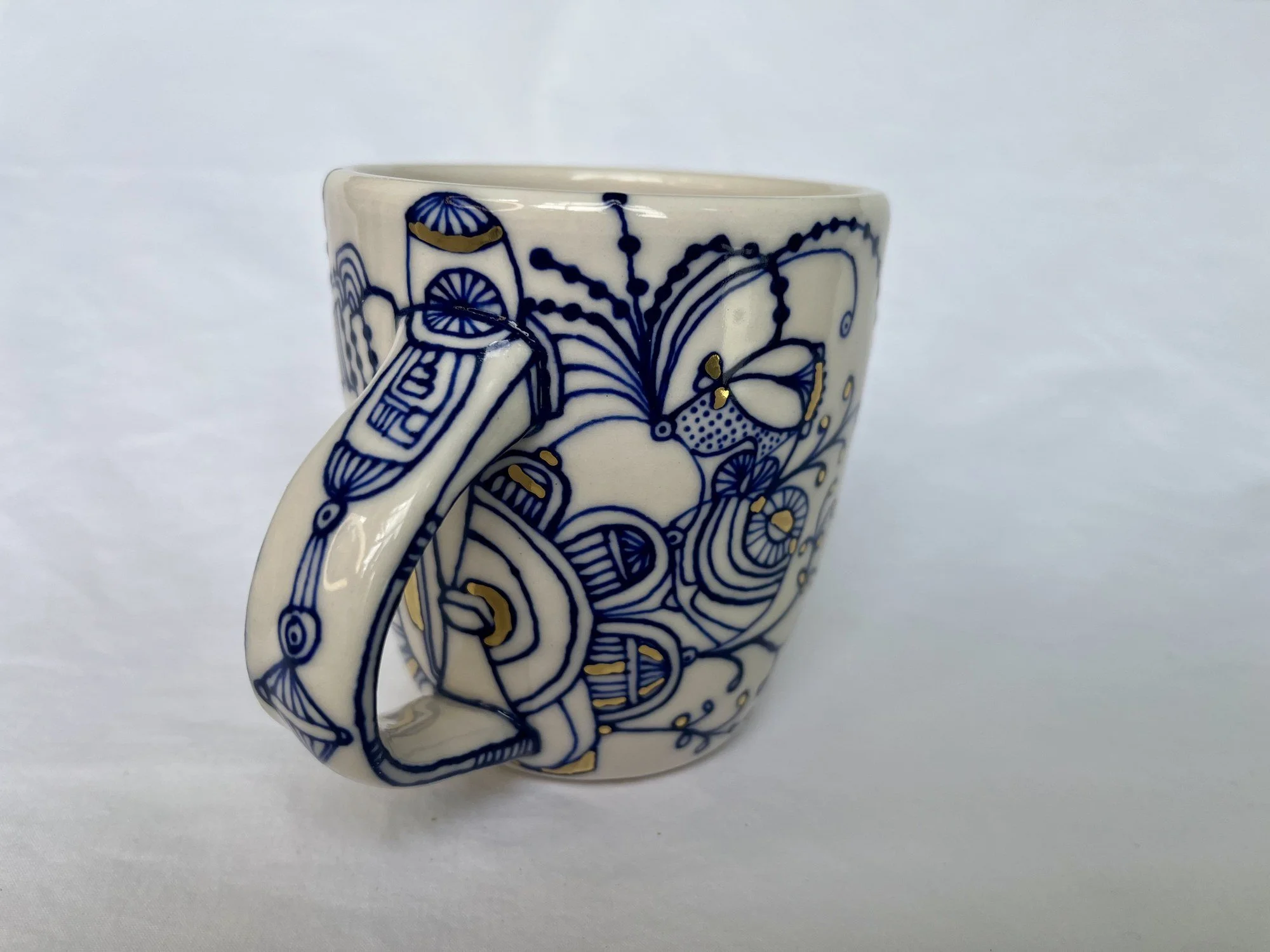 Cobalt blue line work and gold luster detail on handmade porcelain mug No. 006