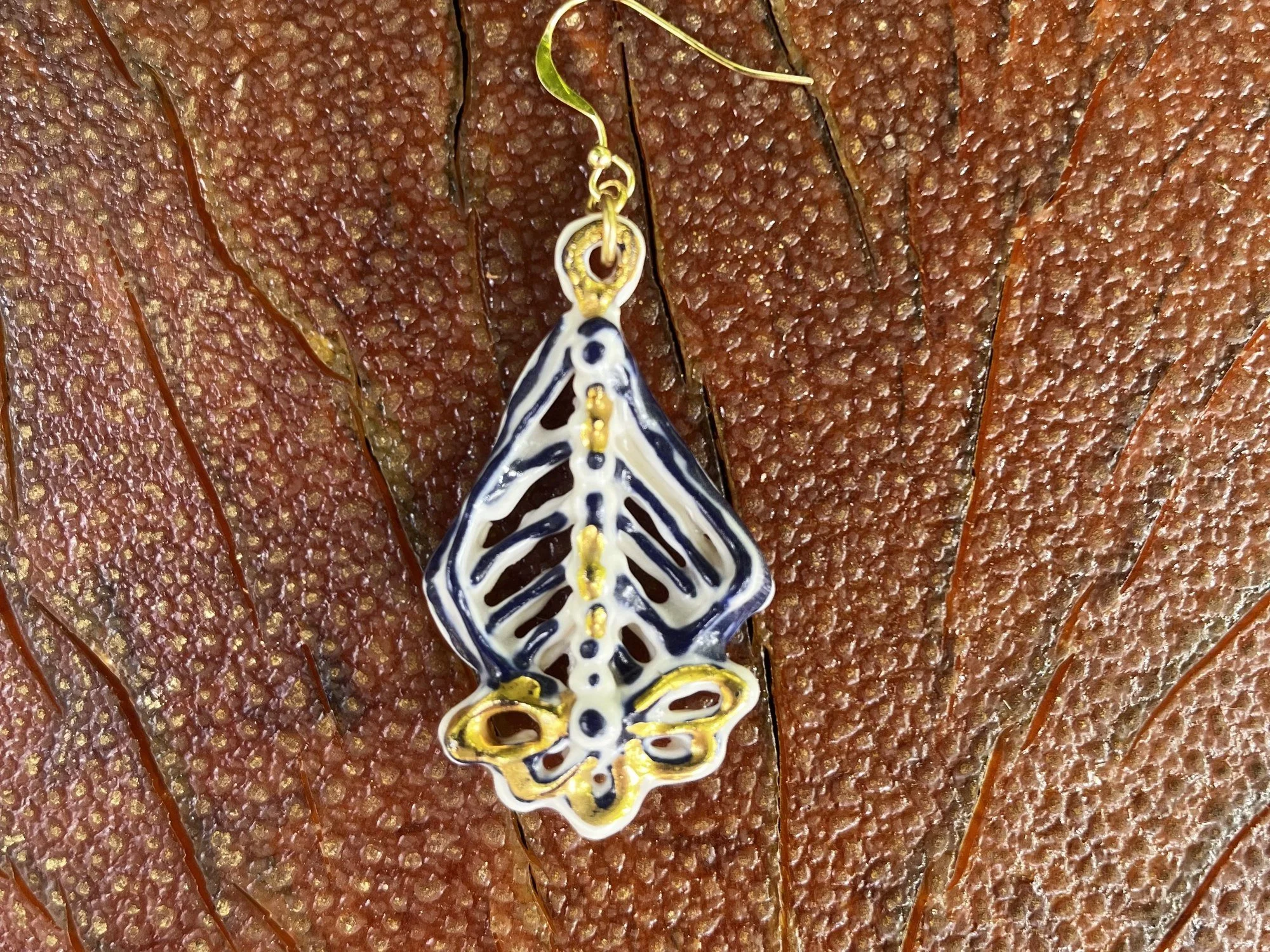 Hand-crafted porcelain earring No. 002 with cobalt blue line work and gold luster detail