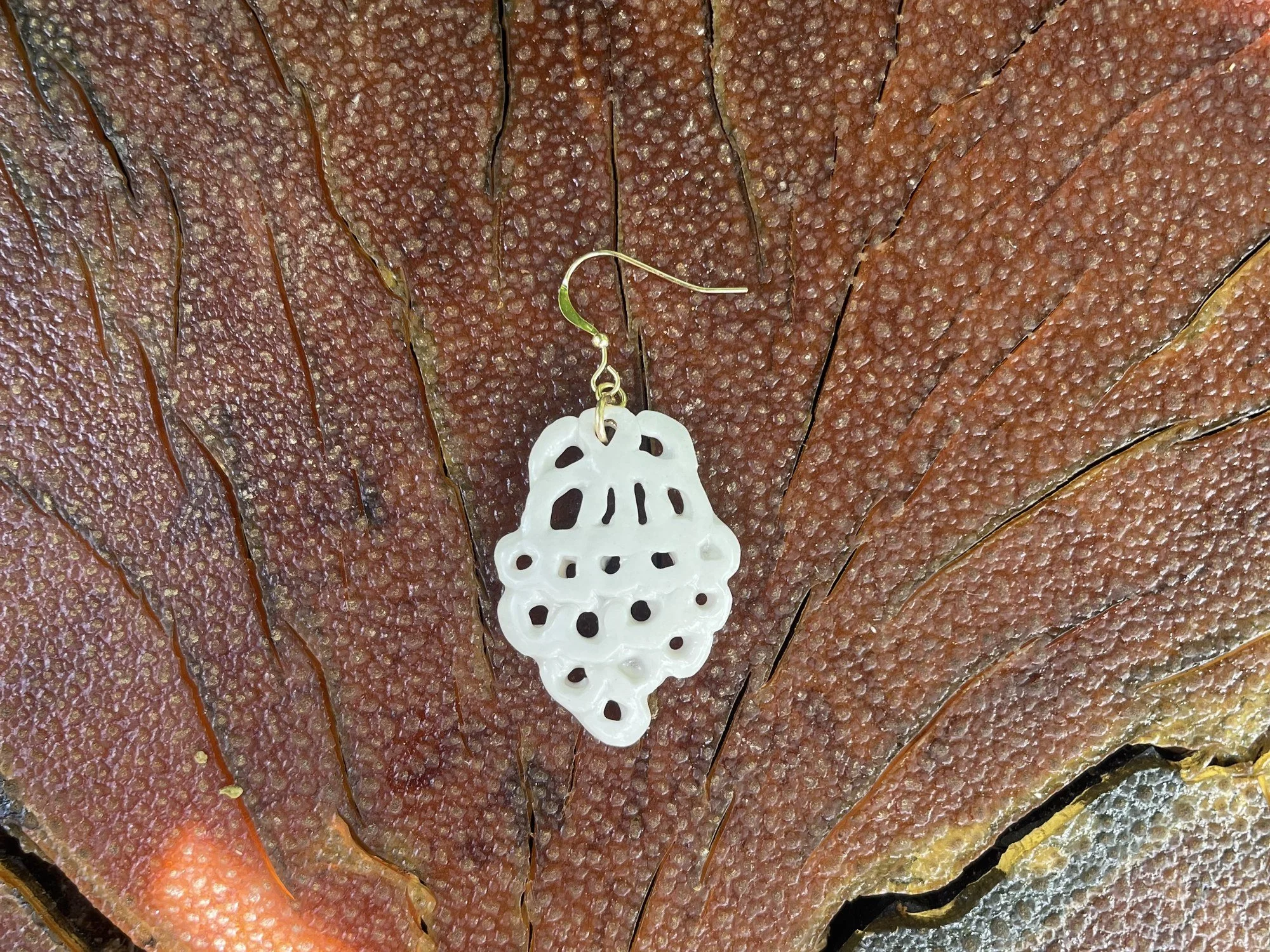 Back of handmade porcelain earring No. 008 on a 14k gold-filled ear wire