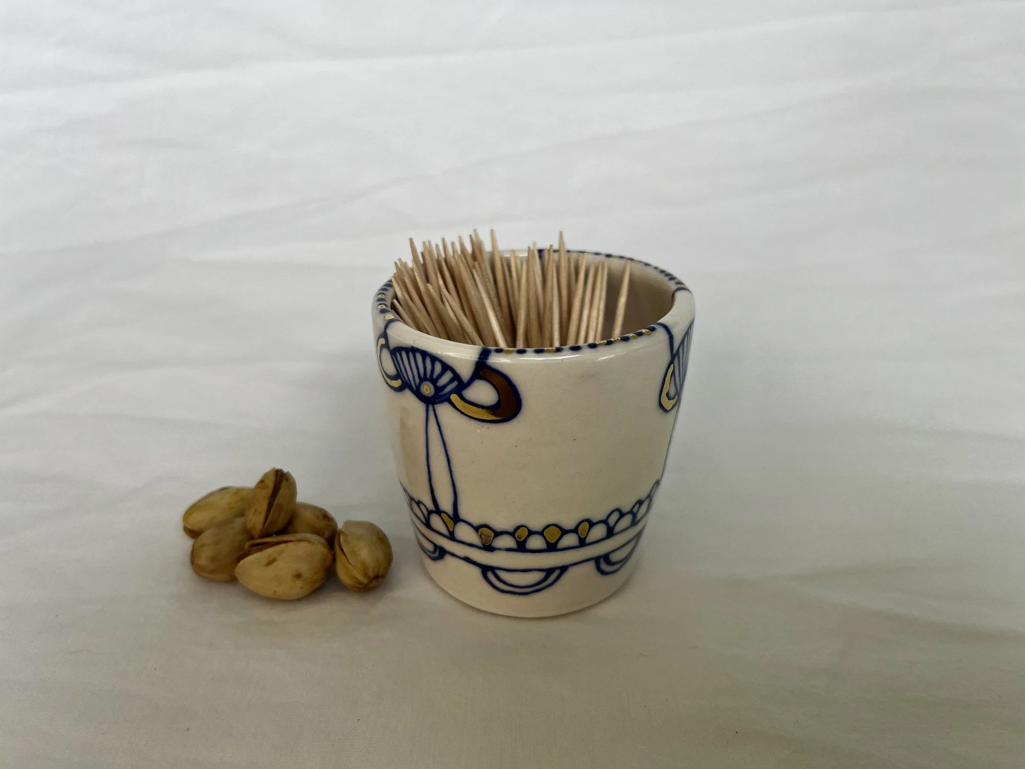 Cobalt blue line work and gold luster detail on handmade porcelain small cup No. 001