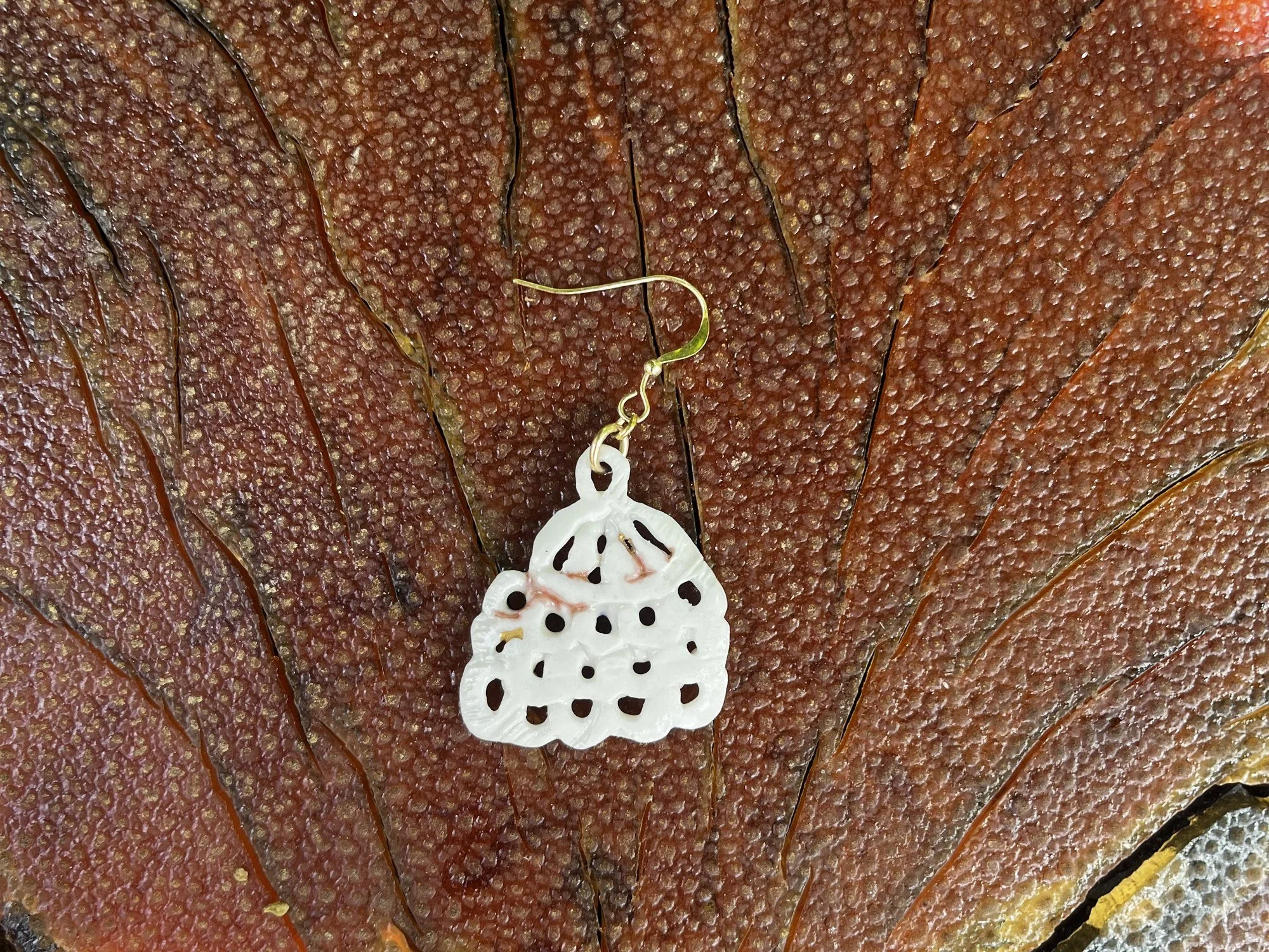 Back of handmade porcelain earring No. 003 on a 14k gold-filled ear wire