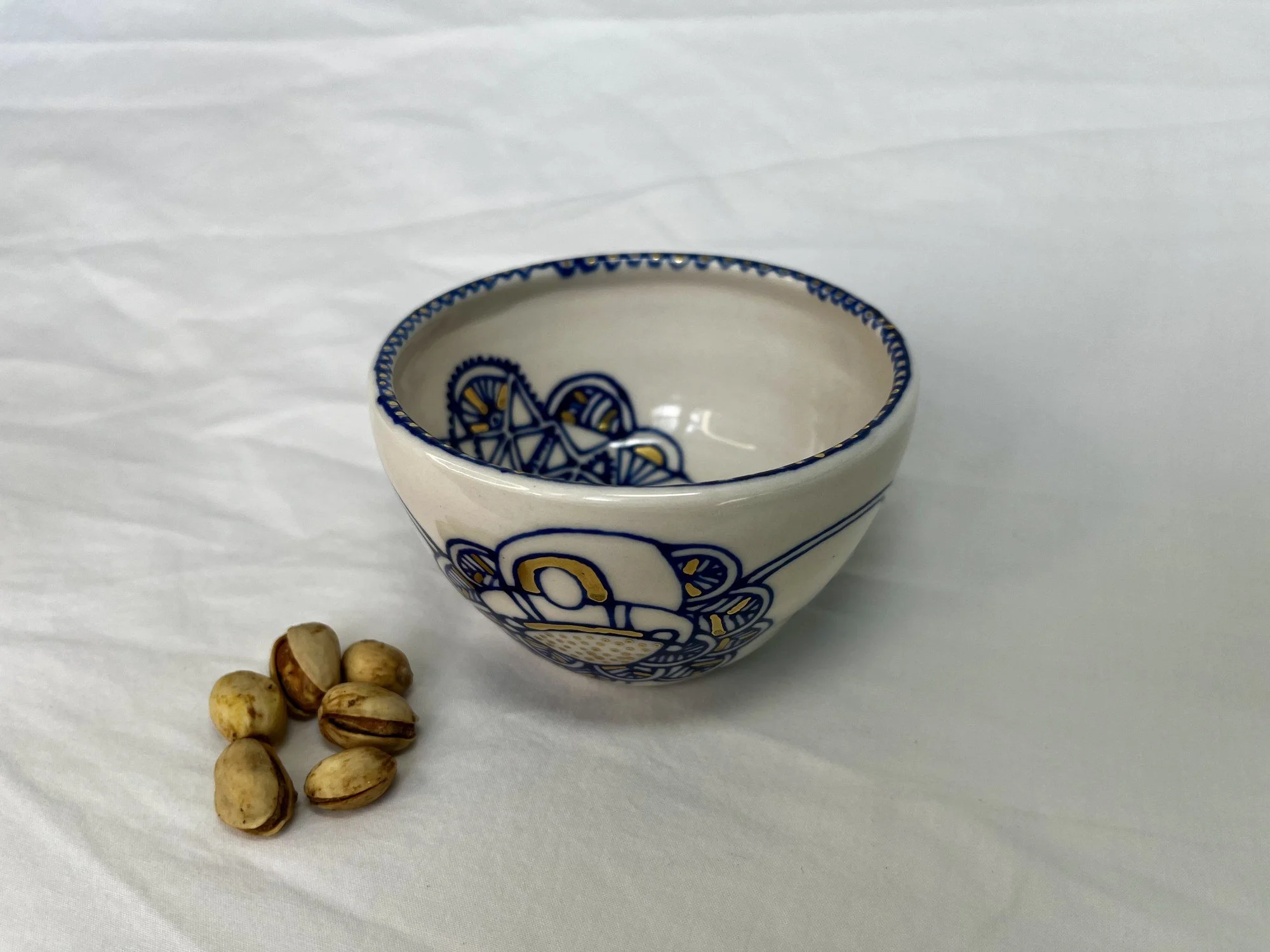 Cobalt blue line work and gold luster detail on handmade porcelain bowl No. 009