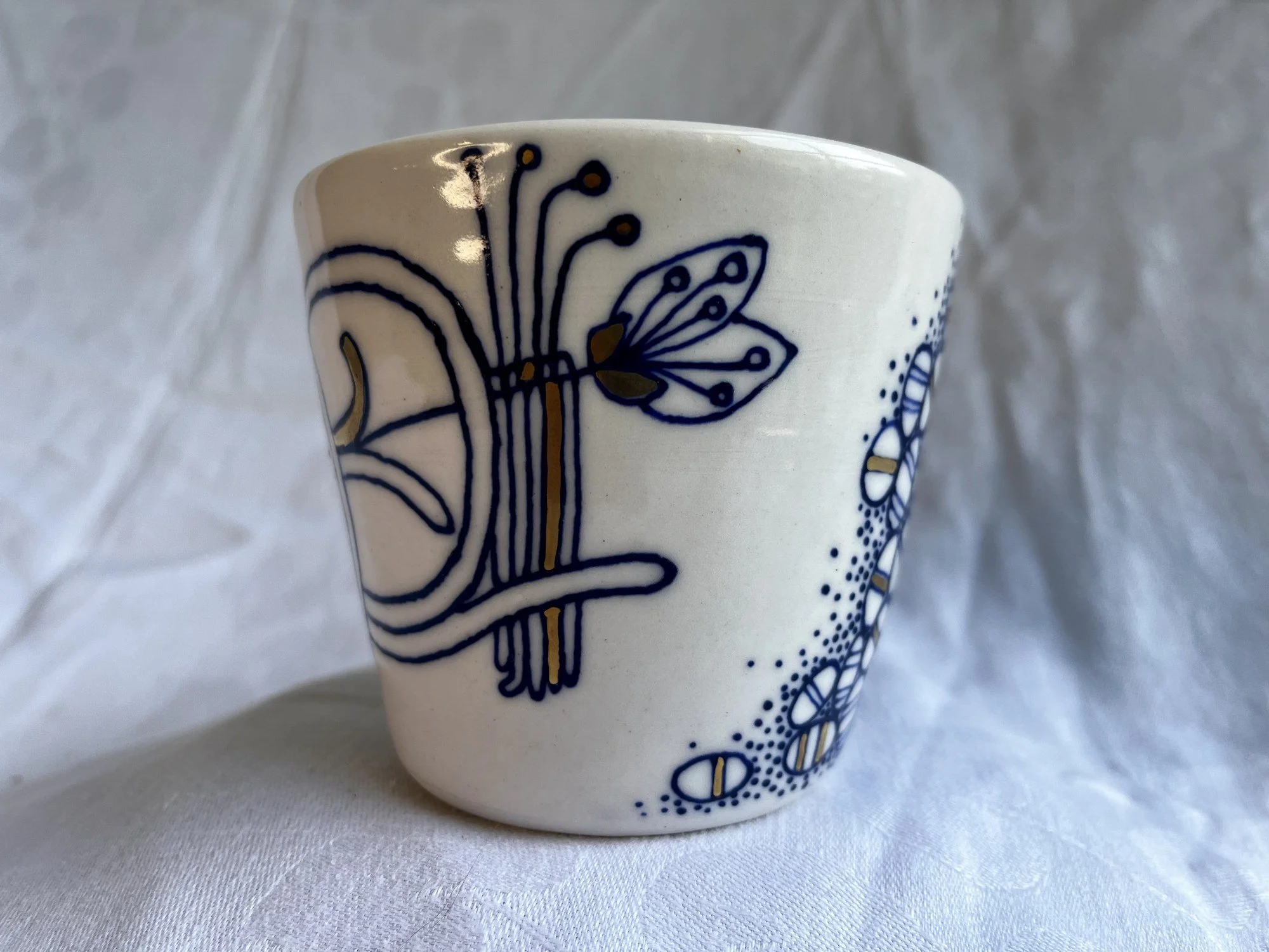 Cobalt blue line work and gold luster detail on handmade porcelain tumbler No. 001