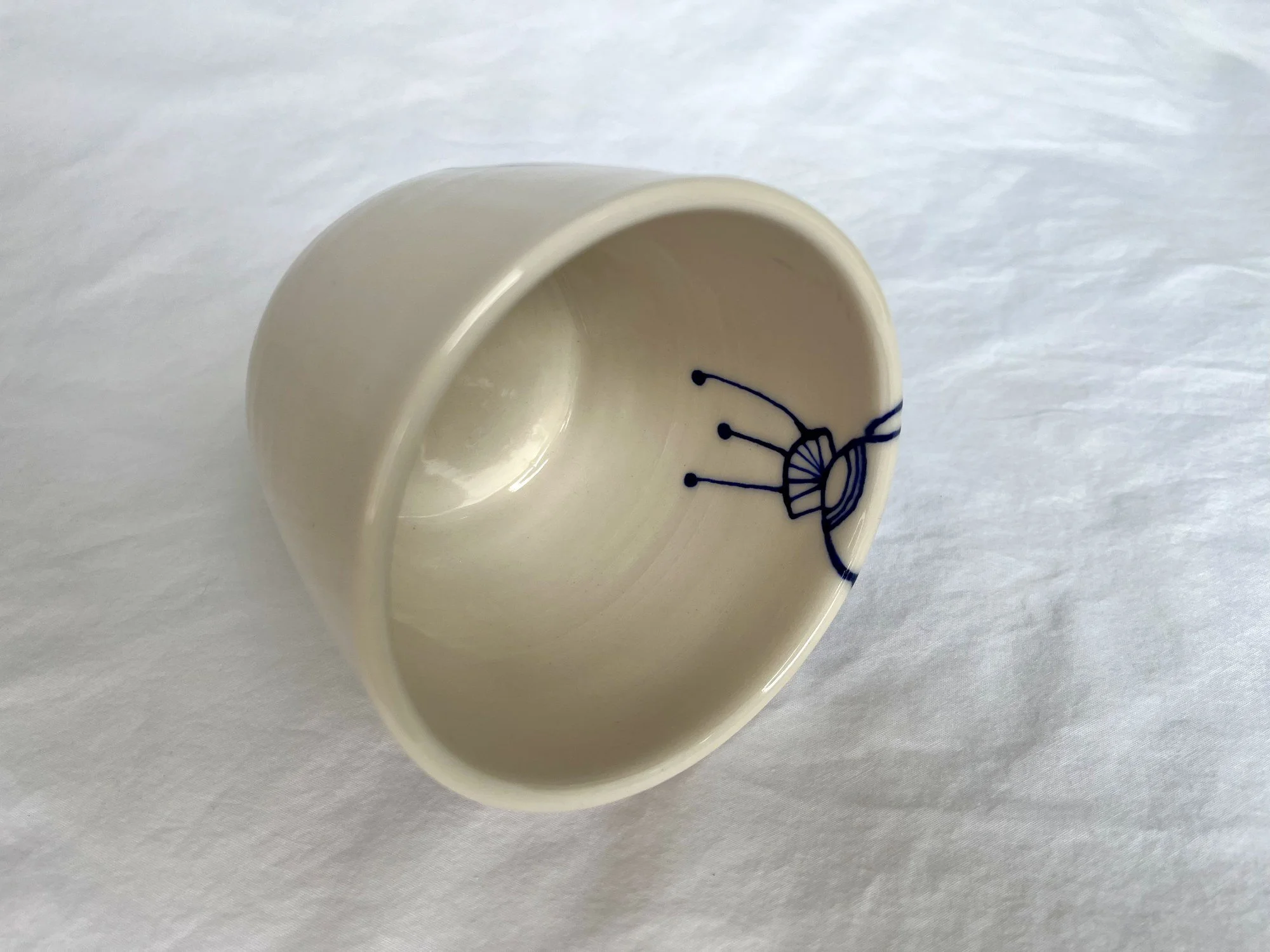 Further view of handmade porcelain mug No. 003 with cobalt blue and gold luster