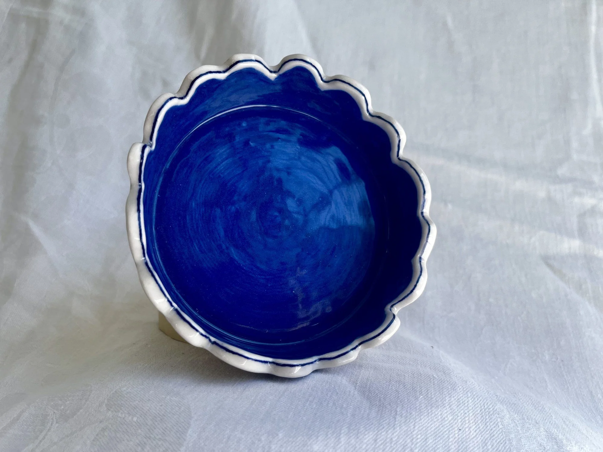 Cobalt blue glazed interior of the matching saucer for porcelain planter No. 001