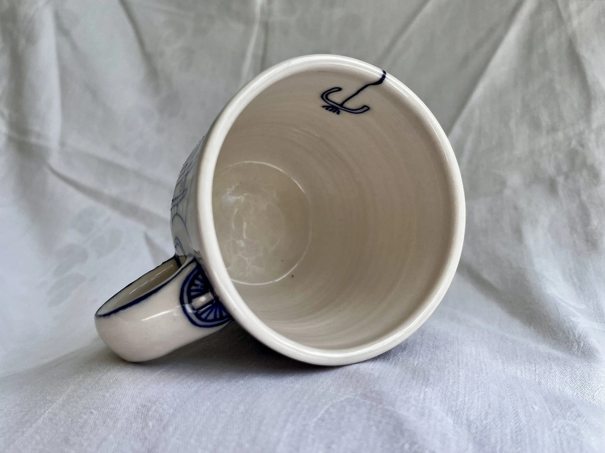 Interior of wheel-thrown porcelain mug No. 030, hand-painted in Naples, Florida