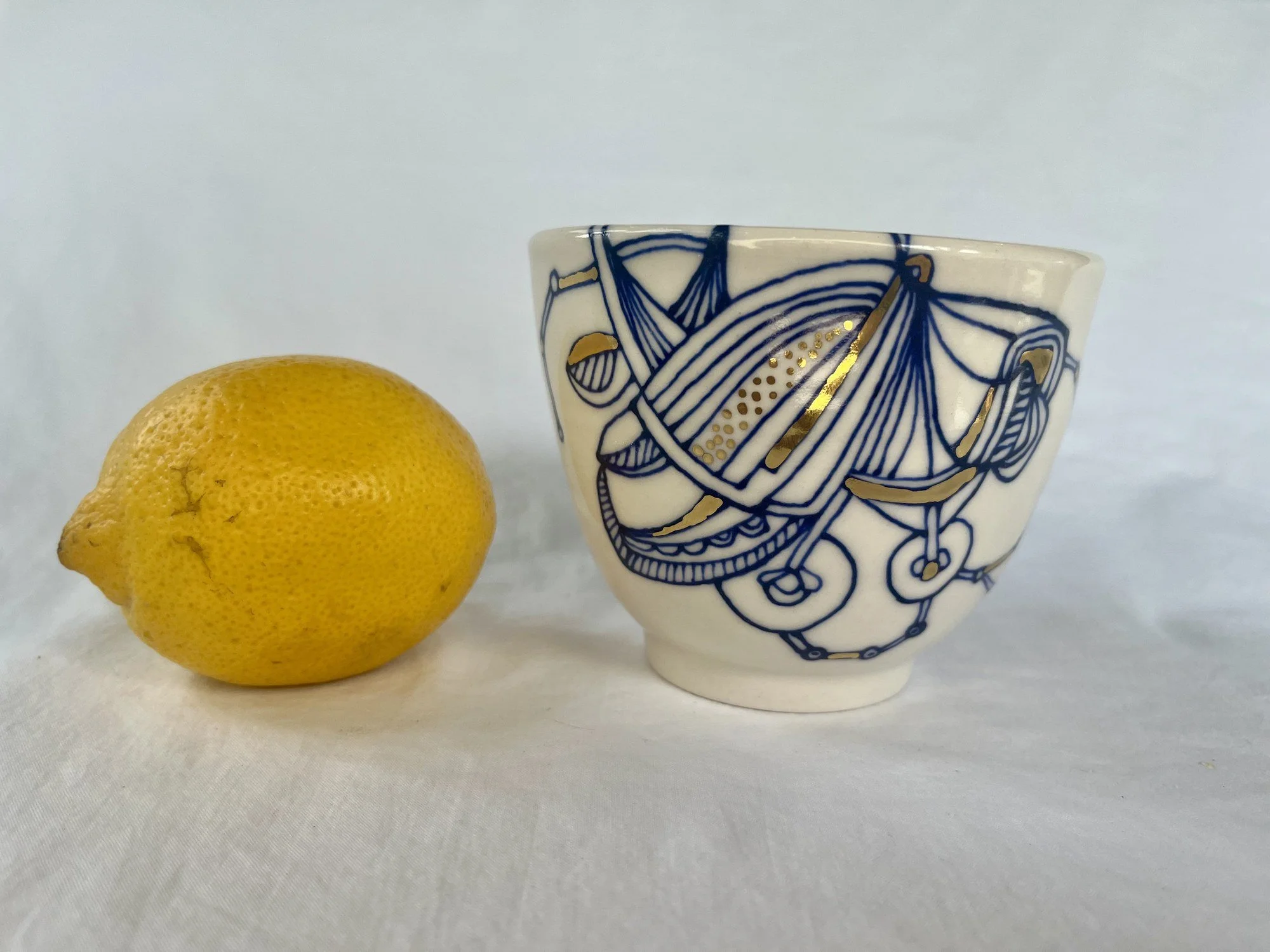 Hand-painted cobalt blue and gold luster porcelain bowl No. 002 by Cypress Knees Ceramics
