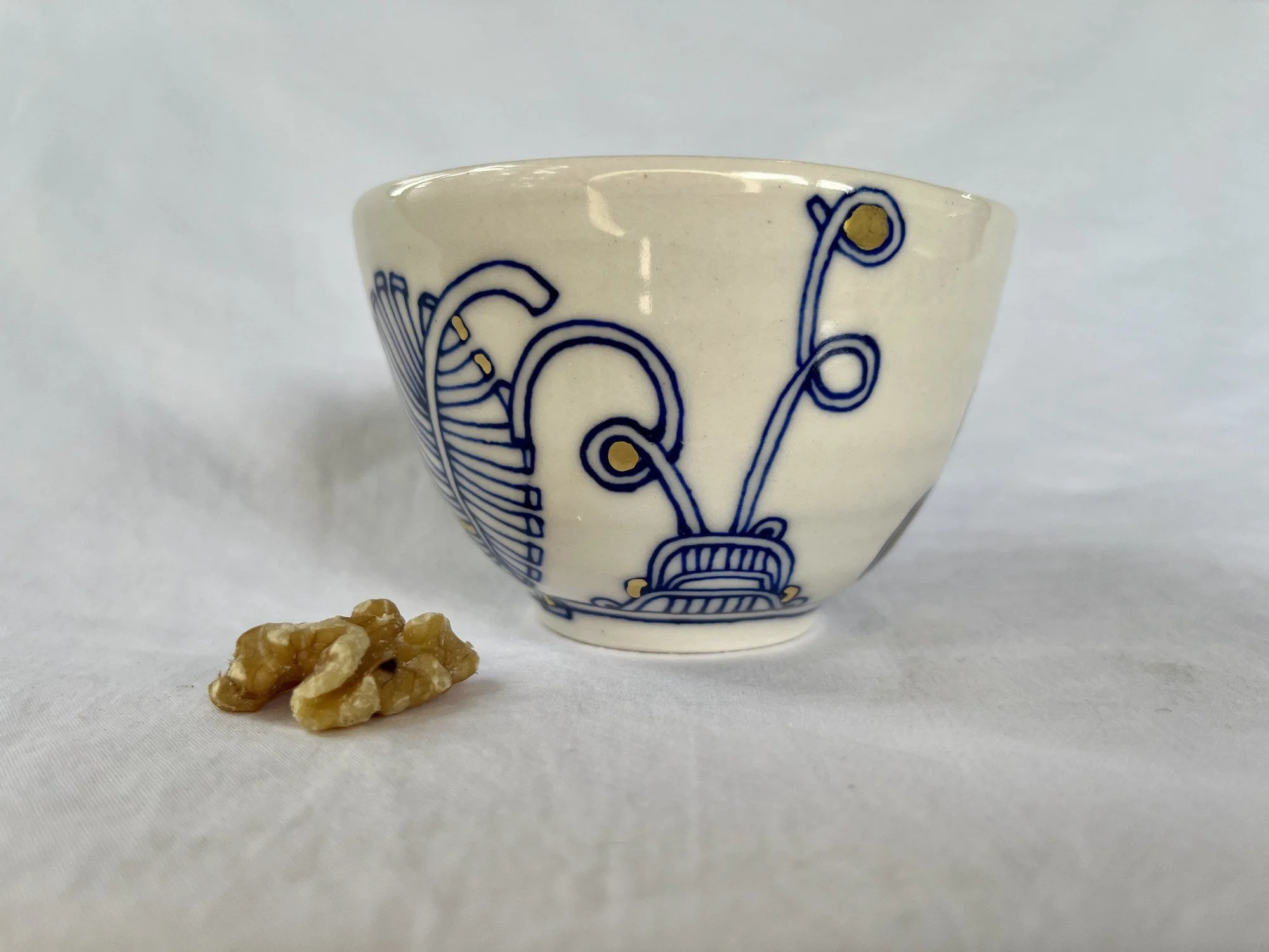 Further view of handmade porcelain bowl No. 001 with cobalt blue and gold luster