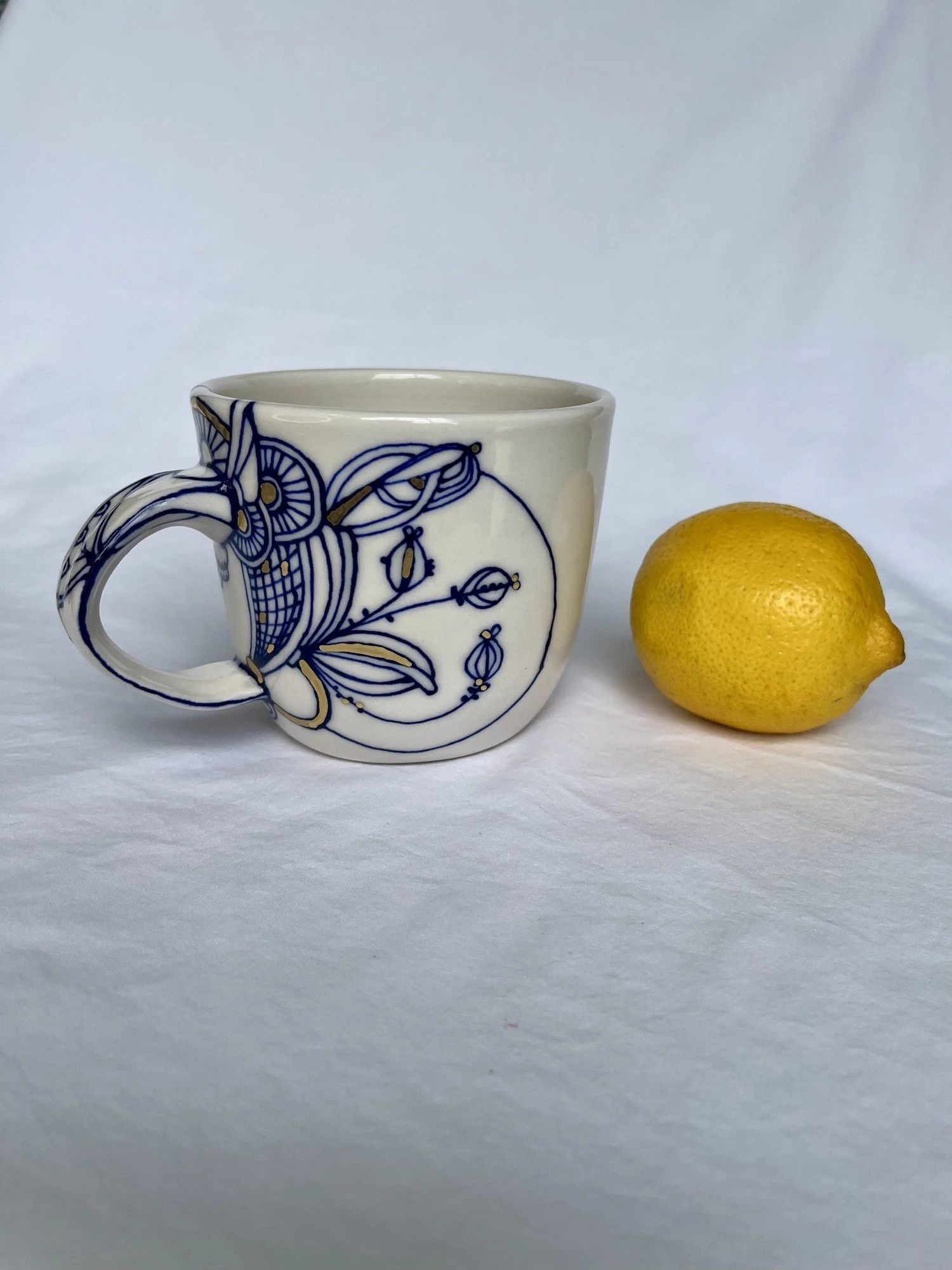 Hand-painted cobalt blue and gold luster porcelain mug No. 003 by Cypress Knees Ceramics