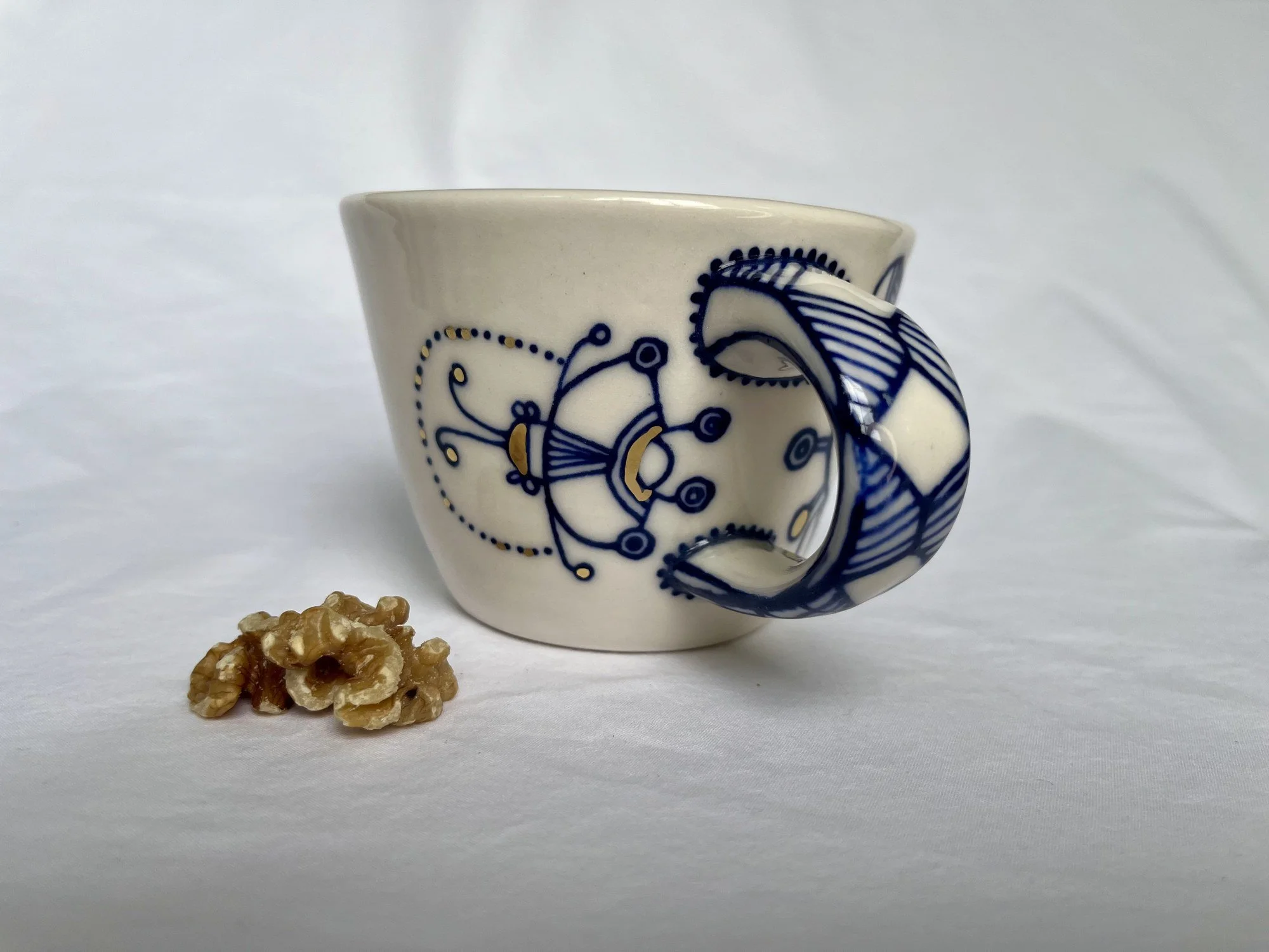 Cobalt blue line work and gold luster detail on handmade porcelain mug No. 011
