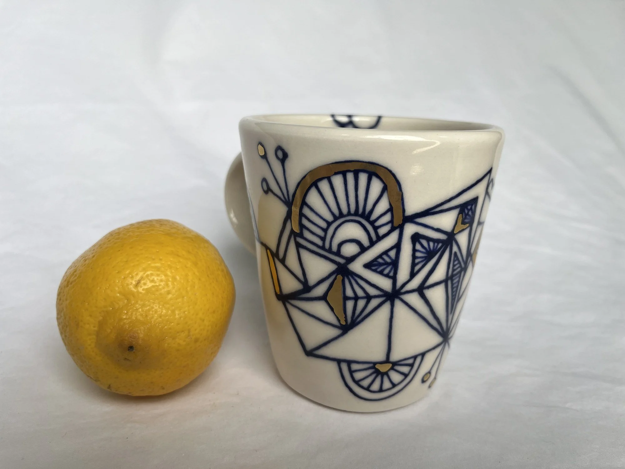 Cobalt blue line work and gold luster detail on handmade porcelain mug No. 017