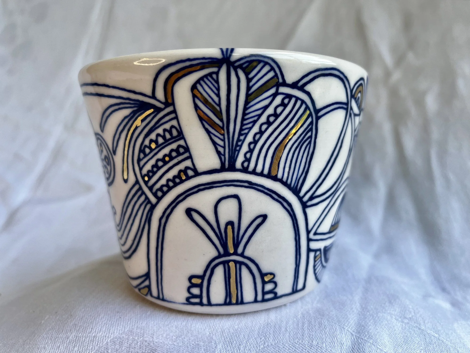 Hand-painted cobalt blue and gold luster porcelain tumbler No. 002 by Cypress Knees Ceramics