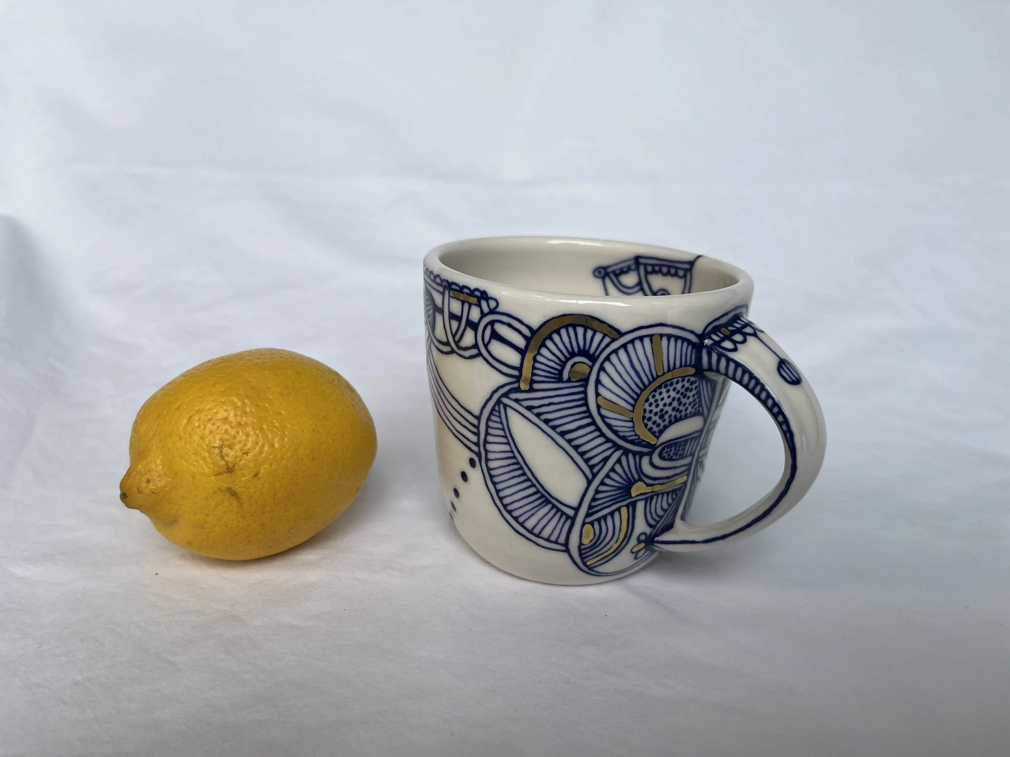 Wheel-thrown porcelain mug No. 002, hand-painted in Naples, Florida