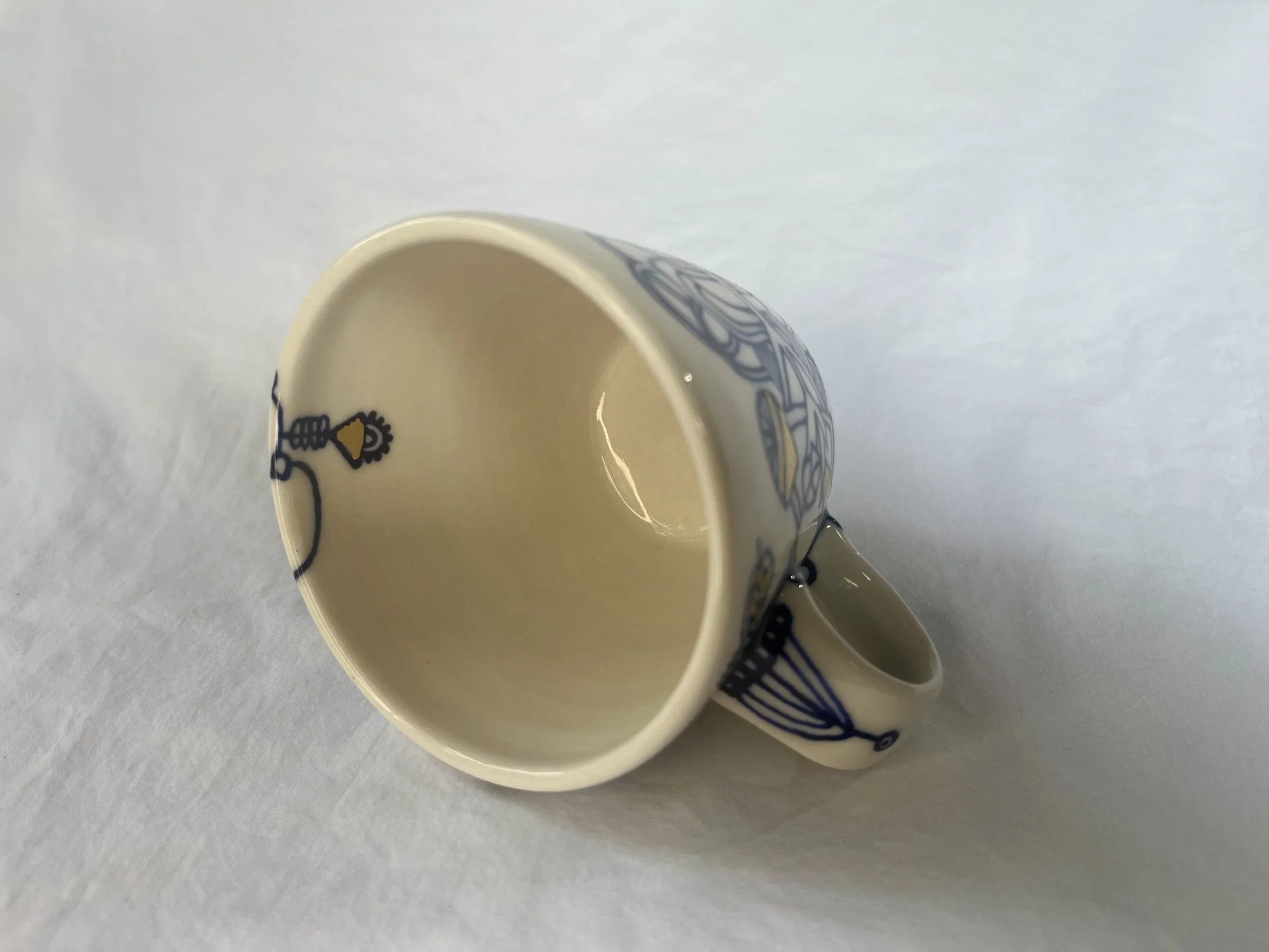 Cobalt blue line work and gold luster detail on handmade porcelain mug No. 022