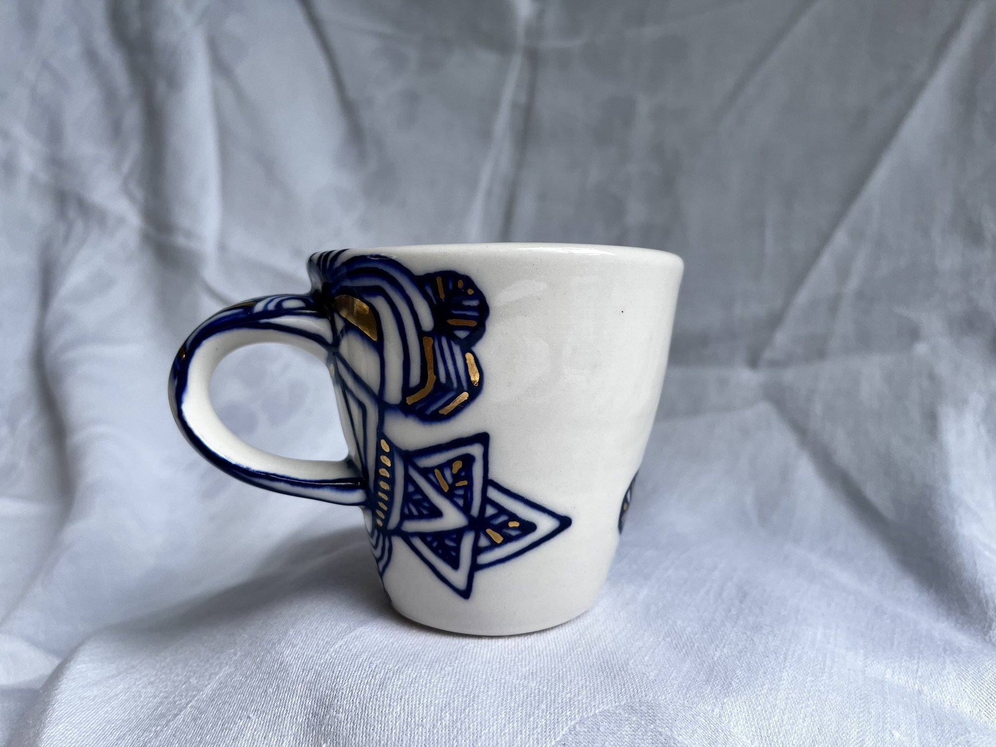 Cobalt blue line work and gold luster detail on handmade porcelain mug No. 028