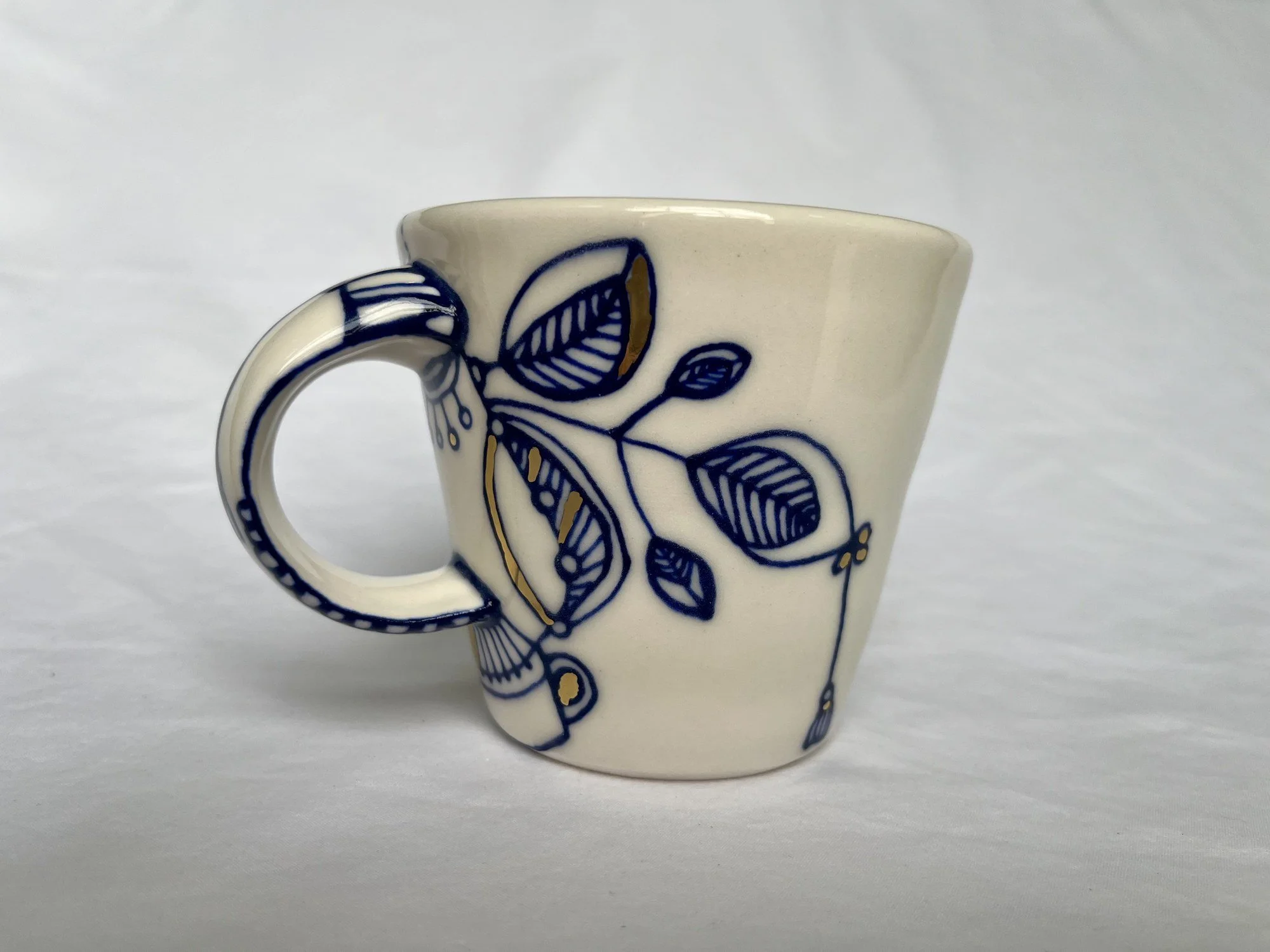 Cobalt blue line work and gold luster detail on handmade porcelain mug No. 015