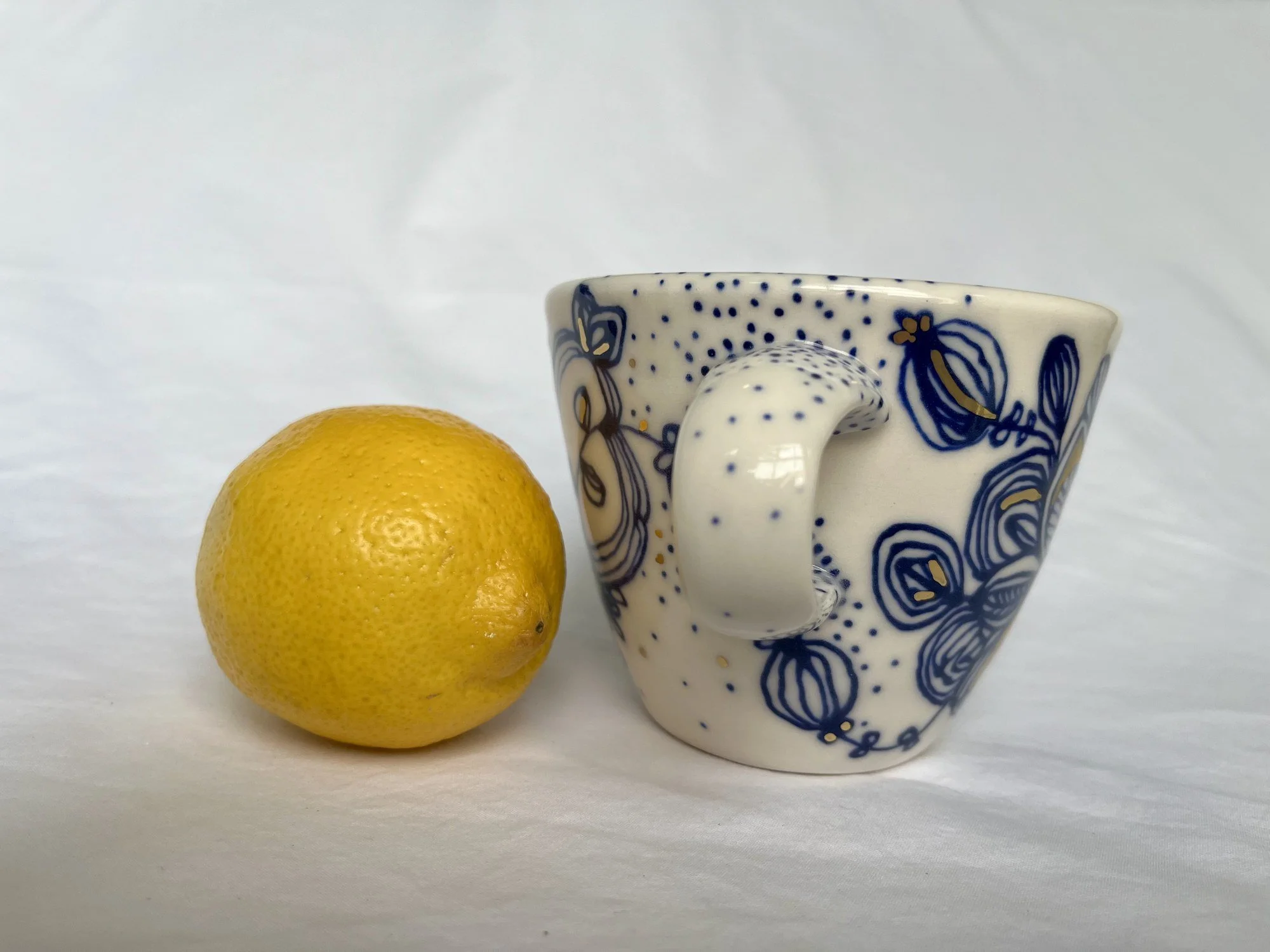 Cobalt blue line work and gold luster detail on handmade porcelain mug No. 016