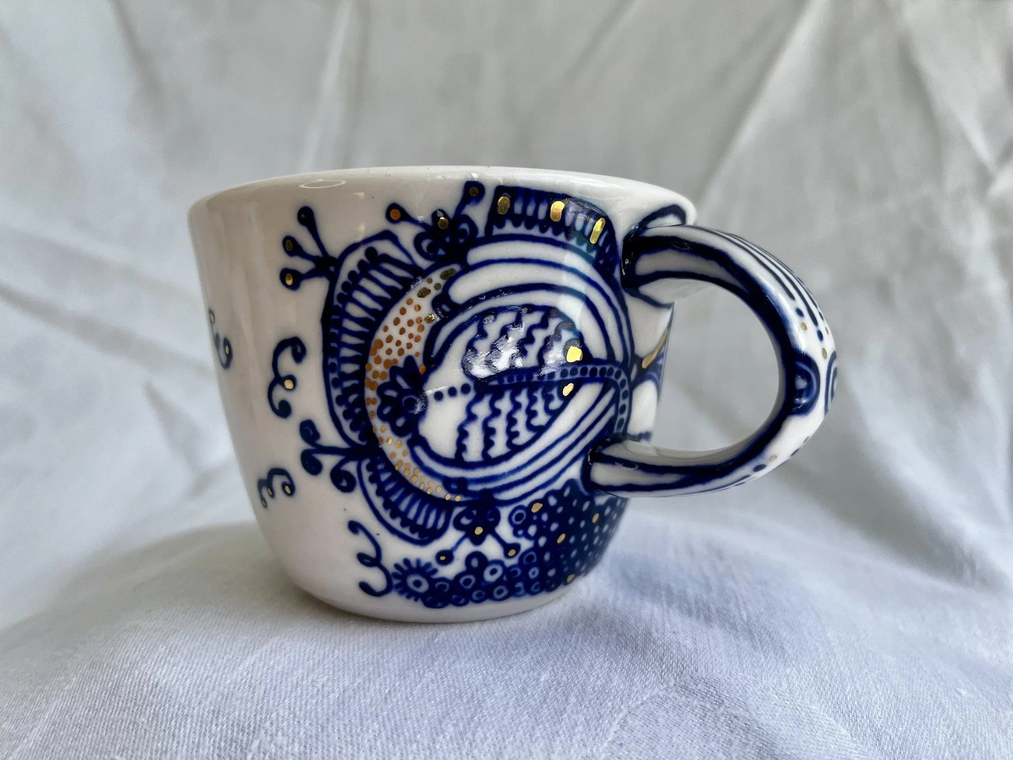 Cobalt blue line work and gold luster detail on handmade porcelain mug No. 031