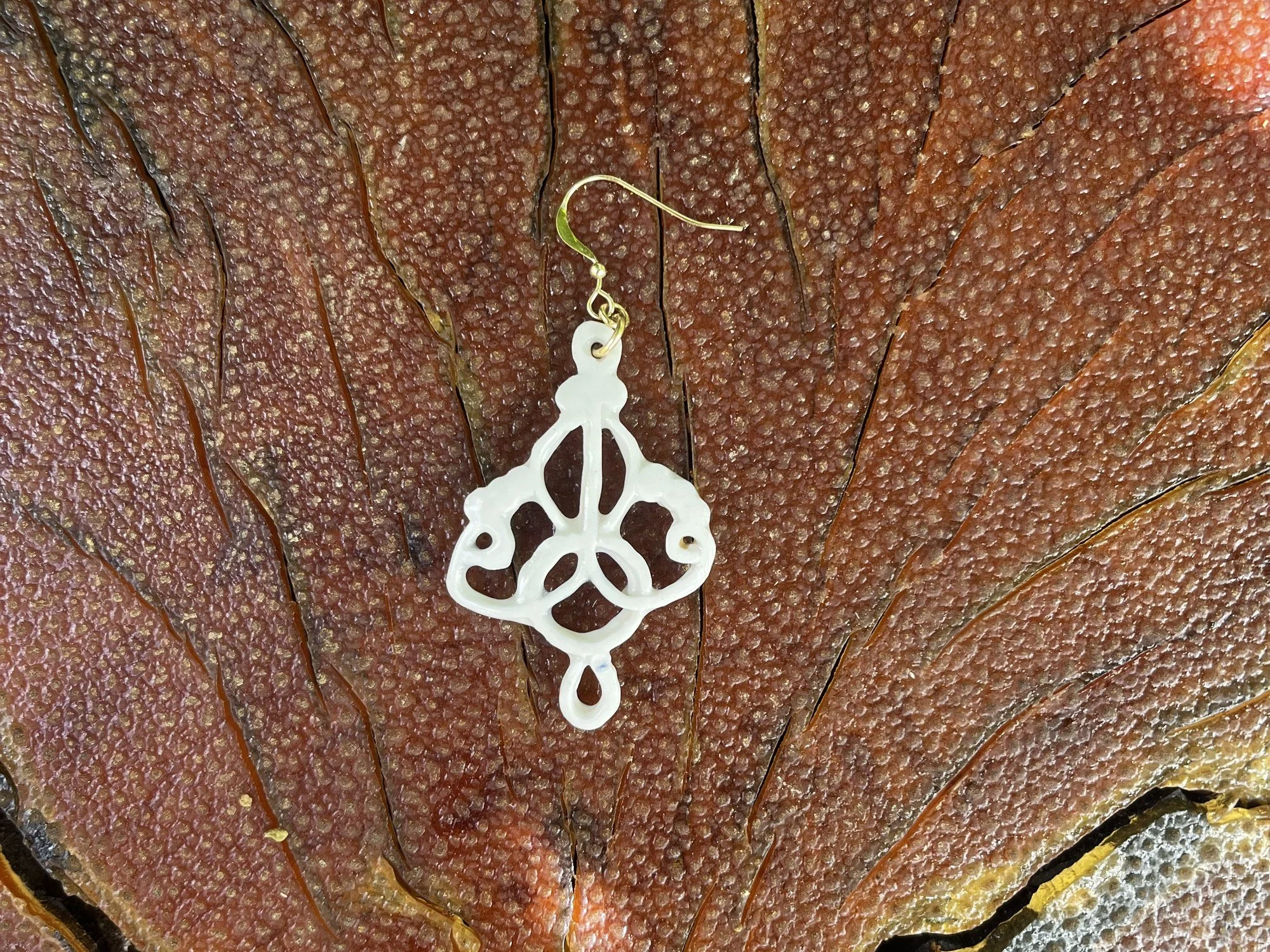 Back of handmade porcelain earring No. 004 on a 14k gold-filled ear wire