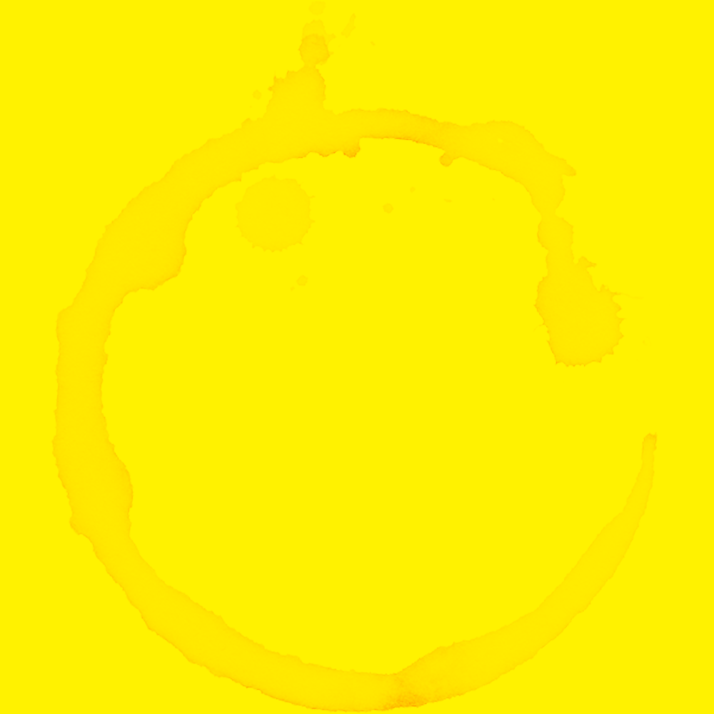 Yellow background with a large, roughly circular red ring stain.