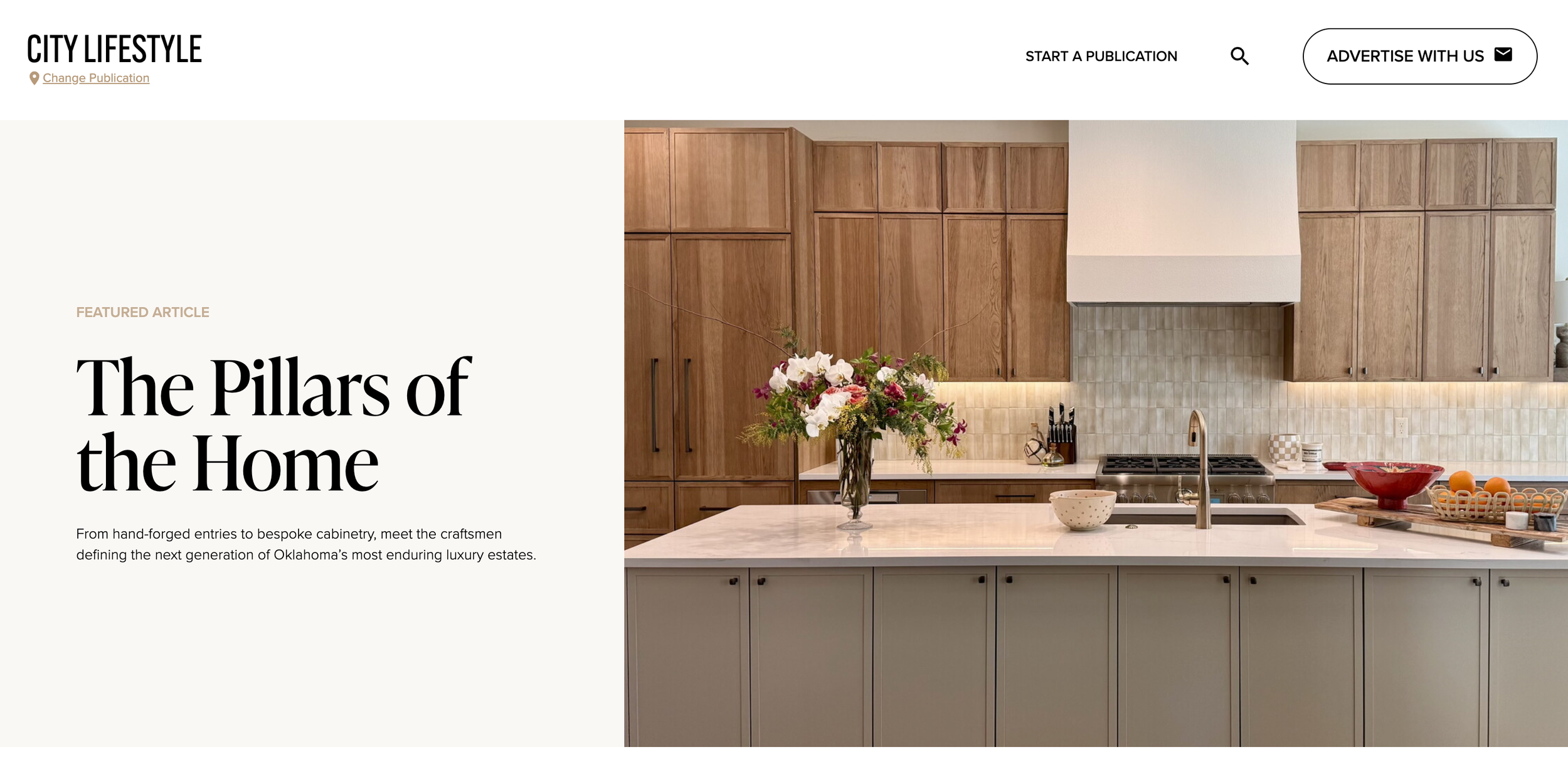 Modern kitchen with wooden cabinets, white marble island counter, flower vase, and various kitchen items.