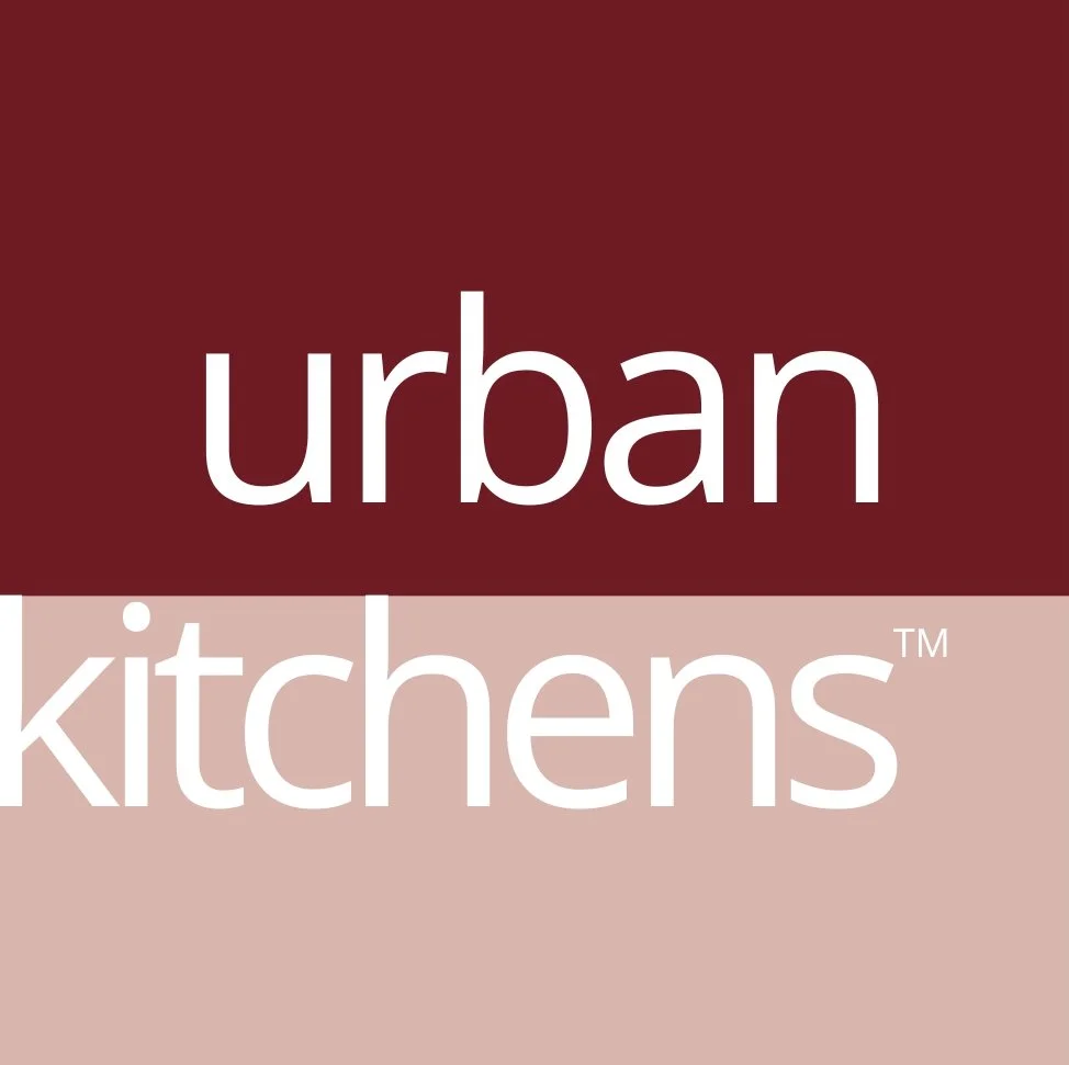 Logo for Urban Kitchens with a red upper background and a beige lower background.