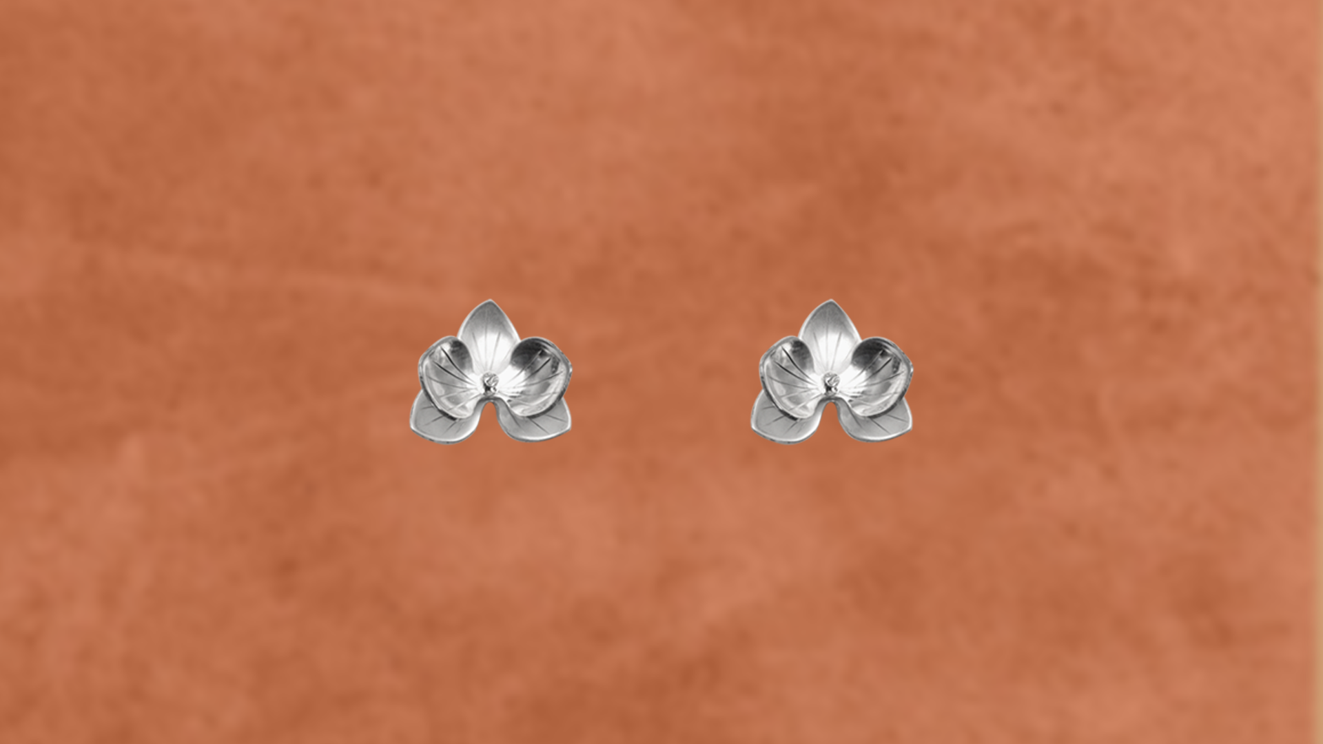 Aretes orquídea