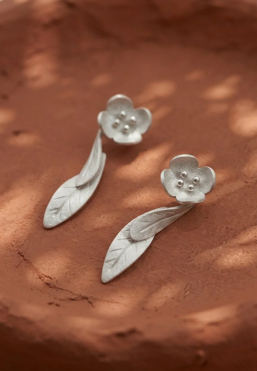 Aretes olivo floreciendo largo