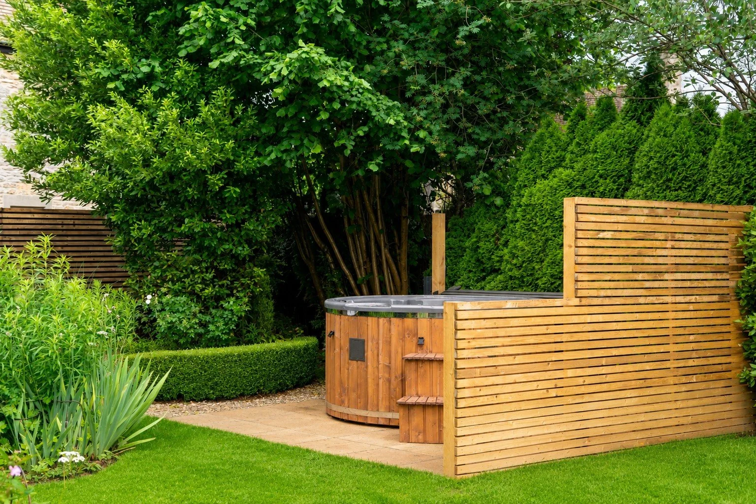 Outdoor hot tub at the rested:restore retreat house to relax in after reformer Pilates sessions