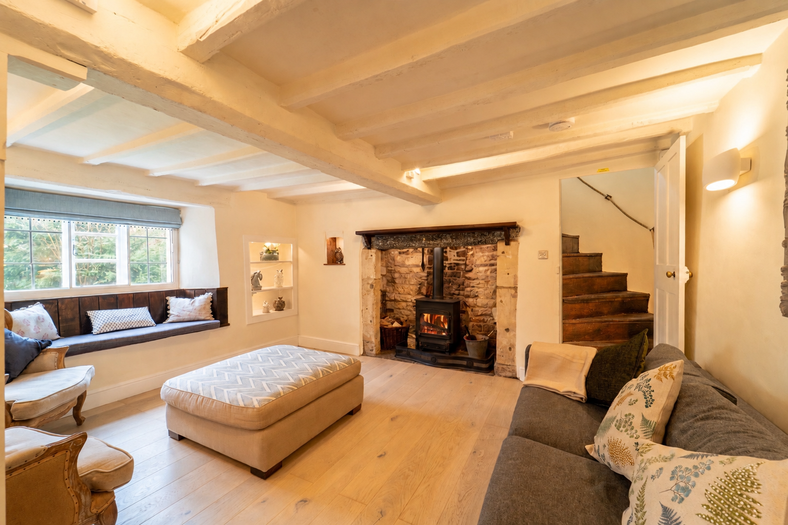 Cozy living room at our reformer retreat house in the Cotswolds