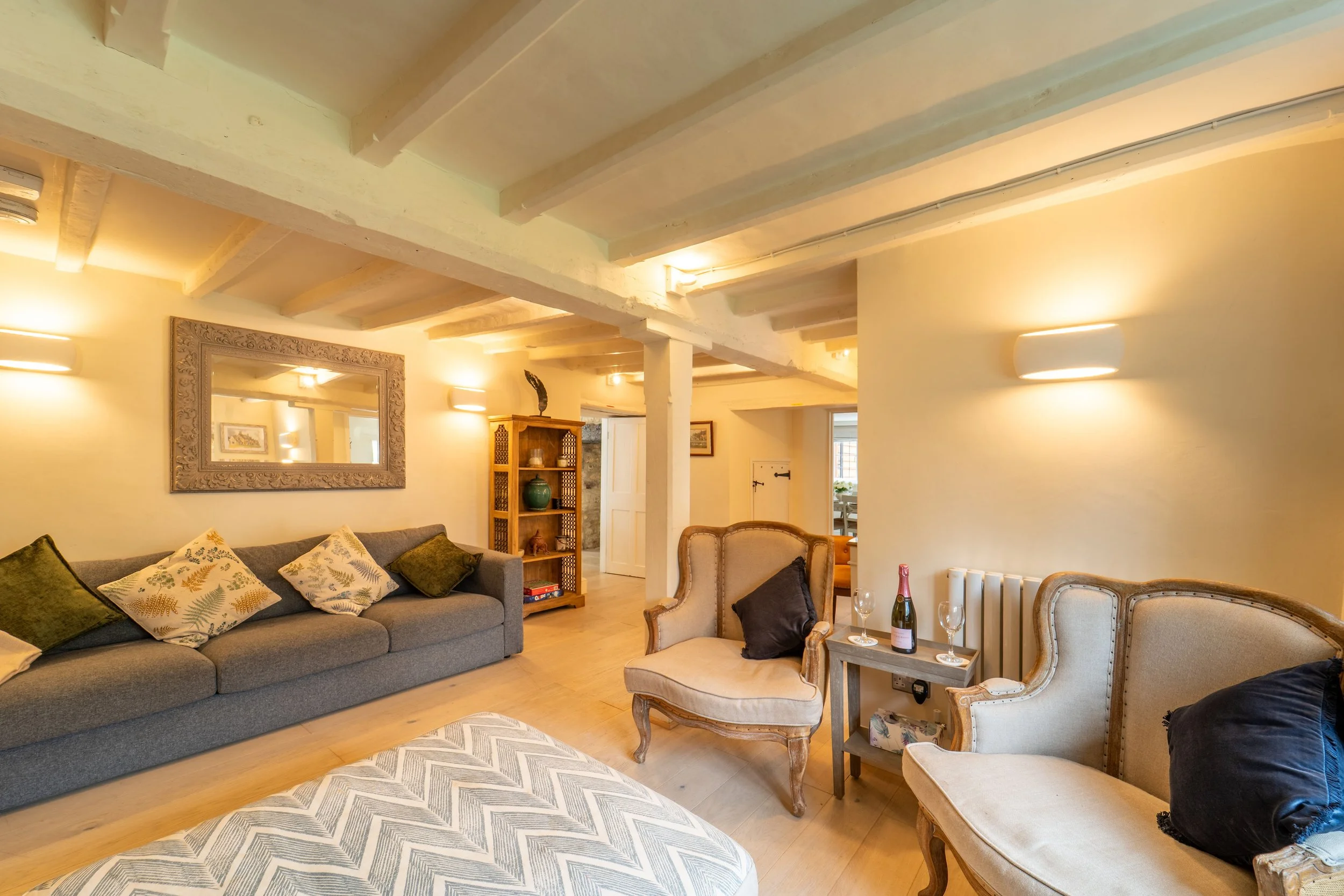 Cosy shared living room at our Cotswold reformer Pilates retreat
