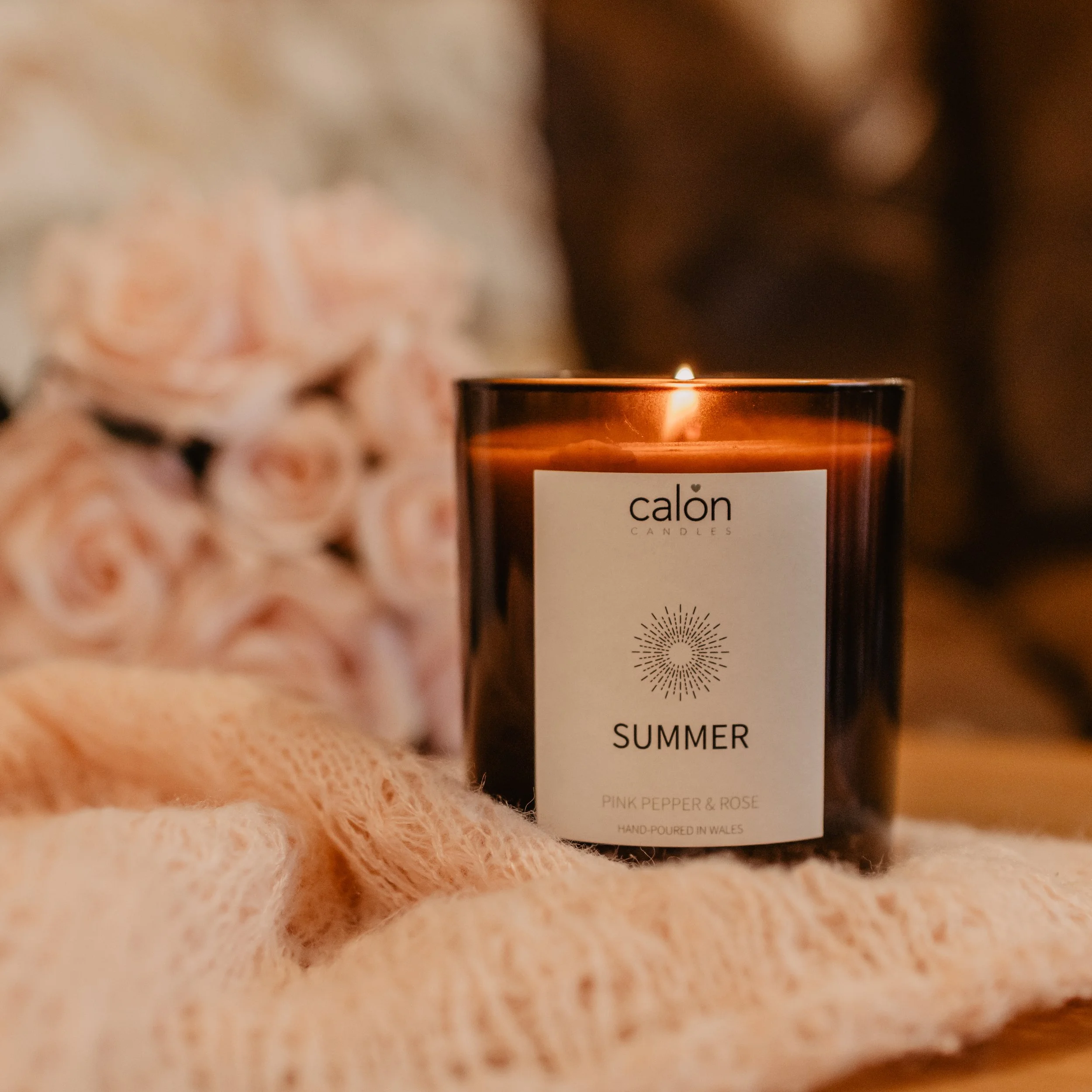 Pink Pepper and Rose summer candle with roses - lifestyle.jpg