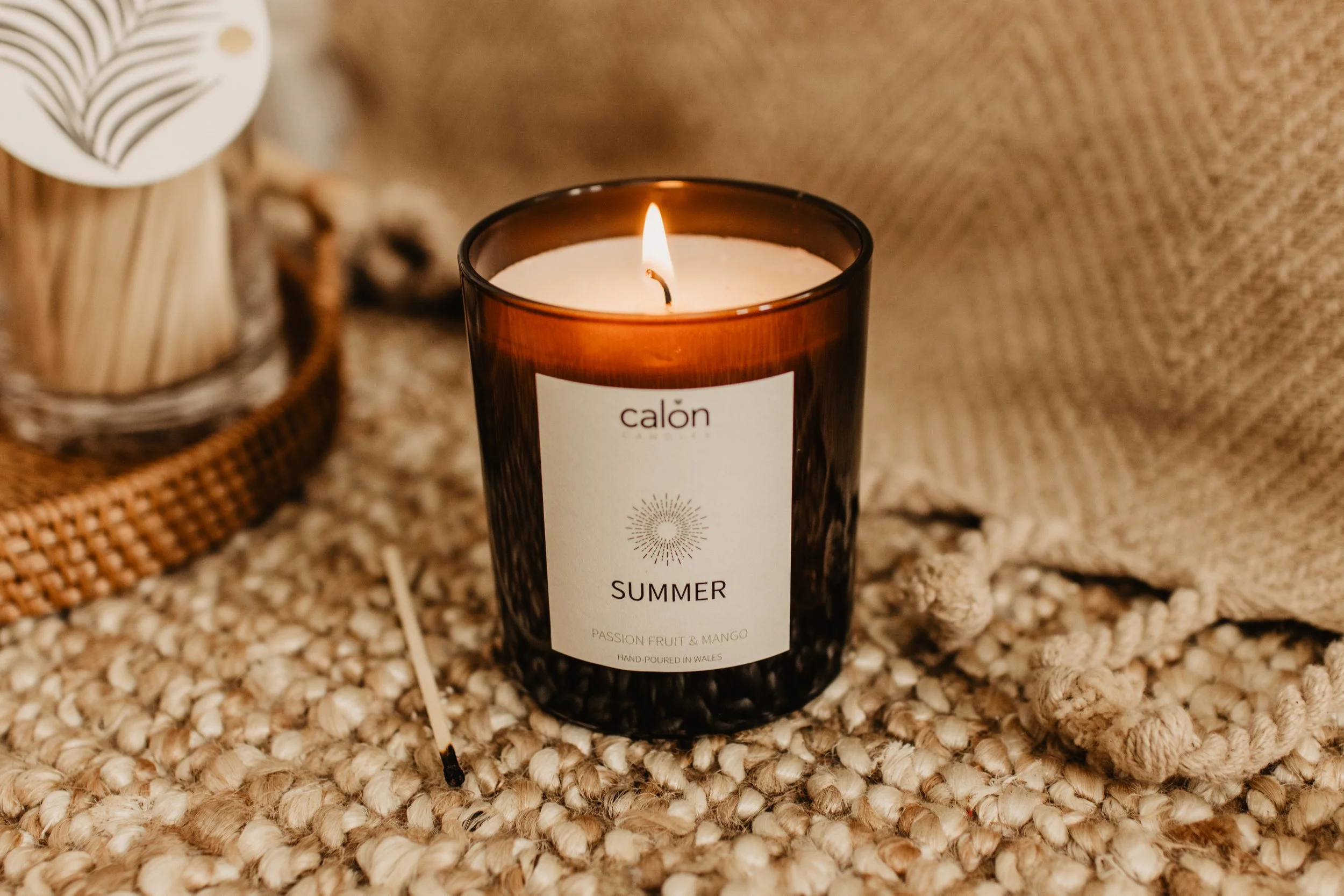 Passion fruit and mango summer candle - lit.jpg