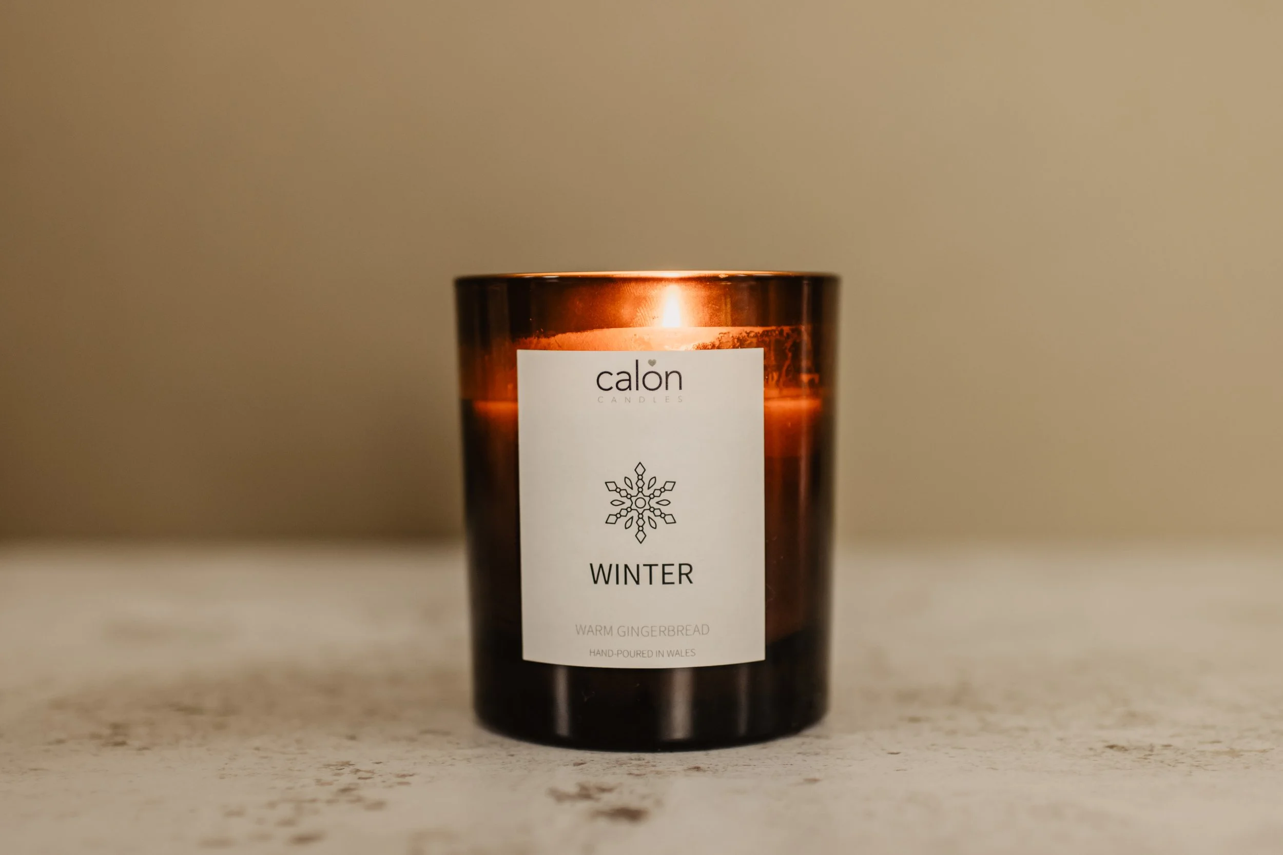 Winter - warm gingerbread amber glass candle.jpg