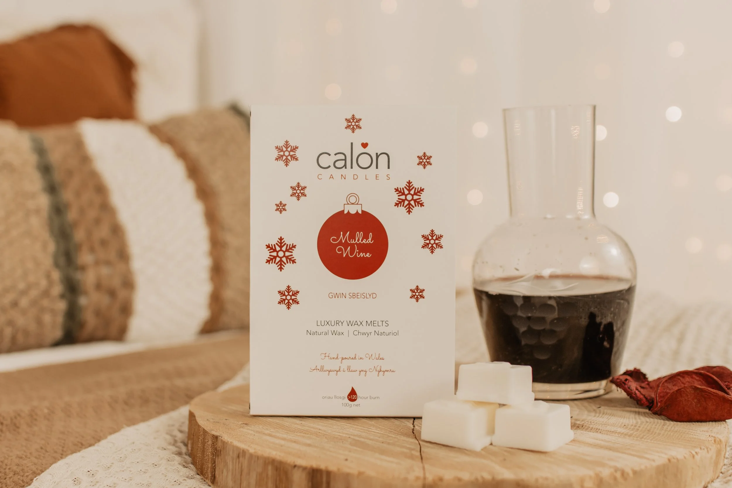 Mulled wine wax melts on wooden board.jpg