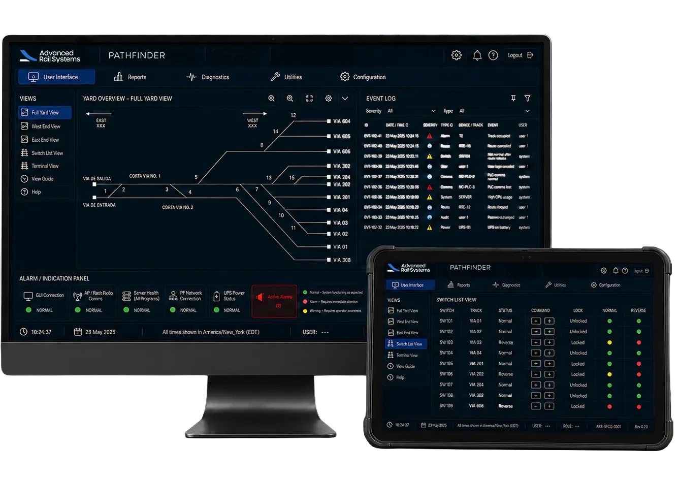 Computer monitor and tablet displaying railway management software with maps, event logs, and switch controls.