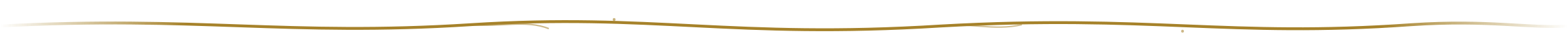 Close-up of a yellow and red safety razor blade with a metallic edge.