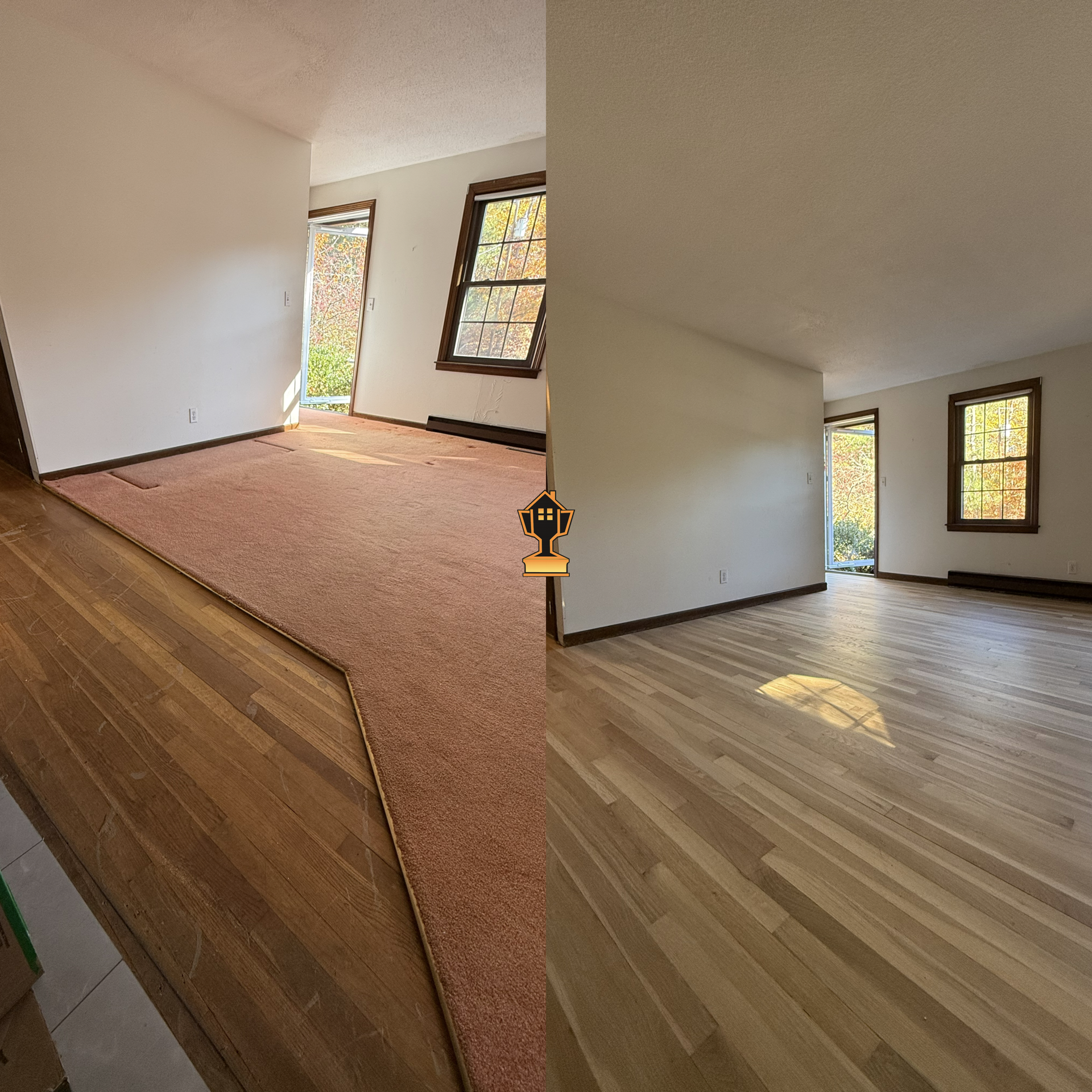 Empty room with white walls, hardwood and carpeted floors, two large windows with wooden frames, and sunlight streaming in.